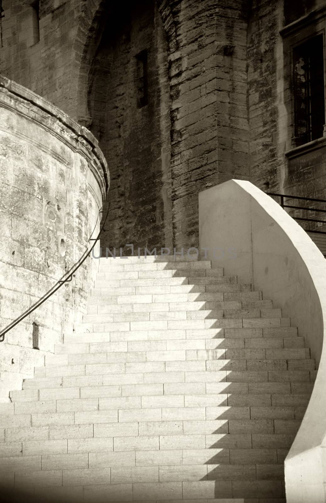 Stairway of the Palace of the Popes in Avignon France in Sepia Tones. 