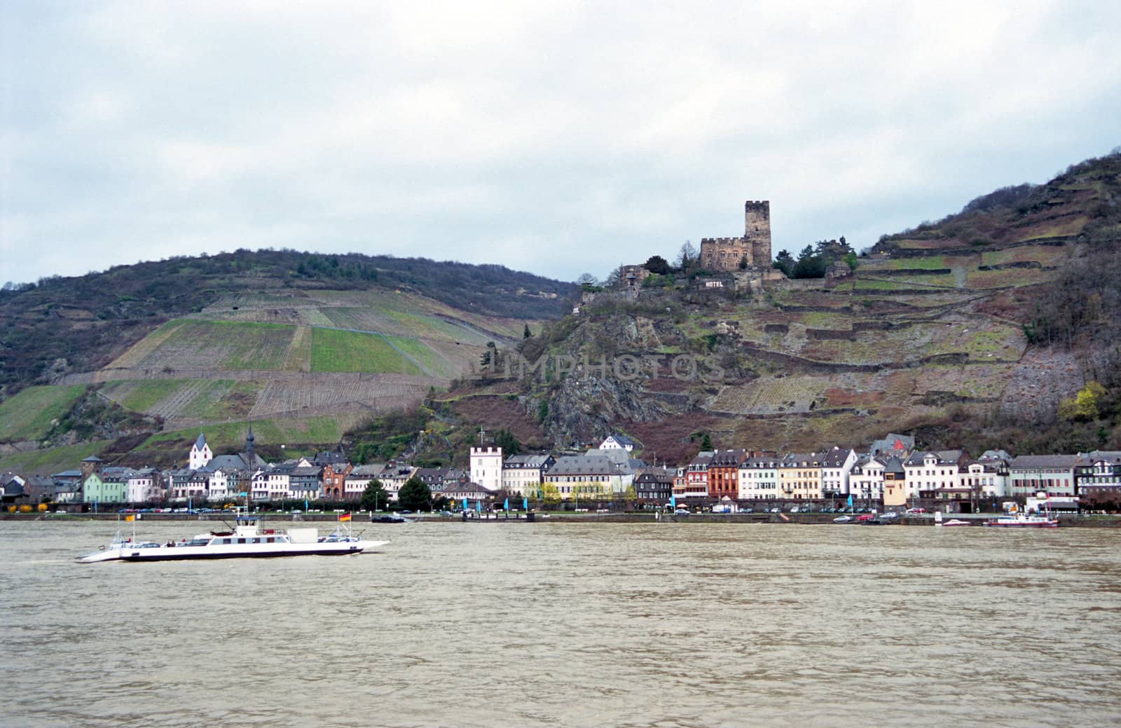 A ferry takes cars across the Rhine river in Germany.