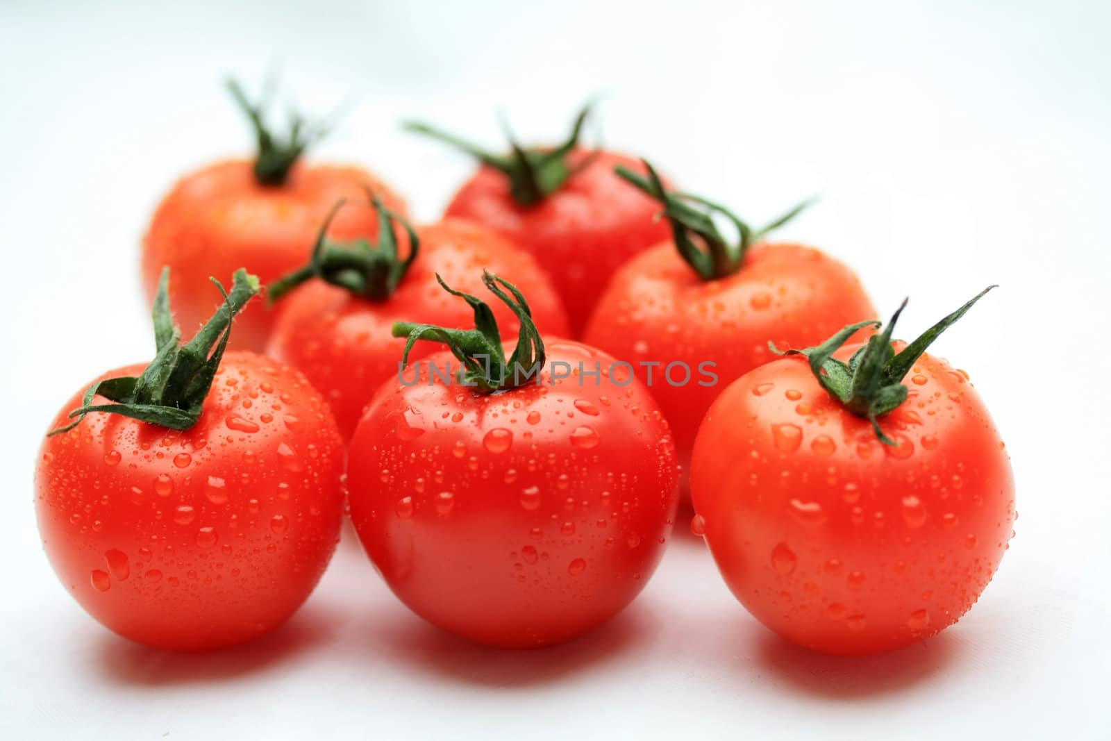 A group of fresh tasty tomatoes