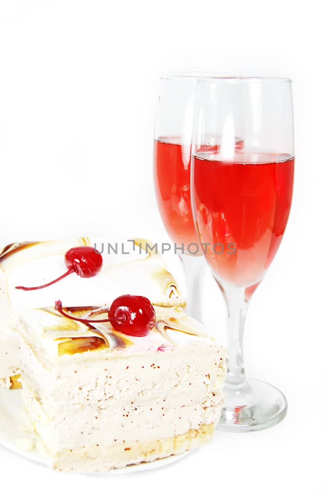 Red wine and cake with cherry in white