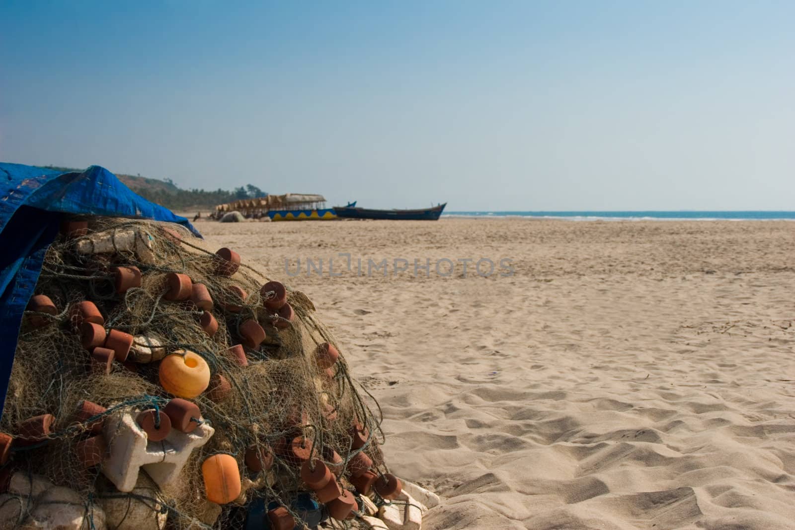 Fishing networks on beach sand