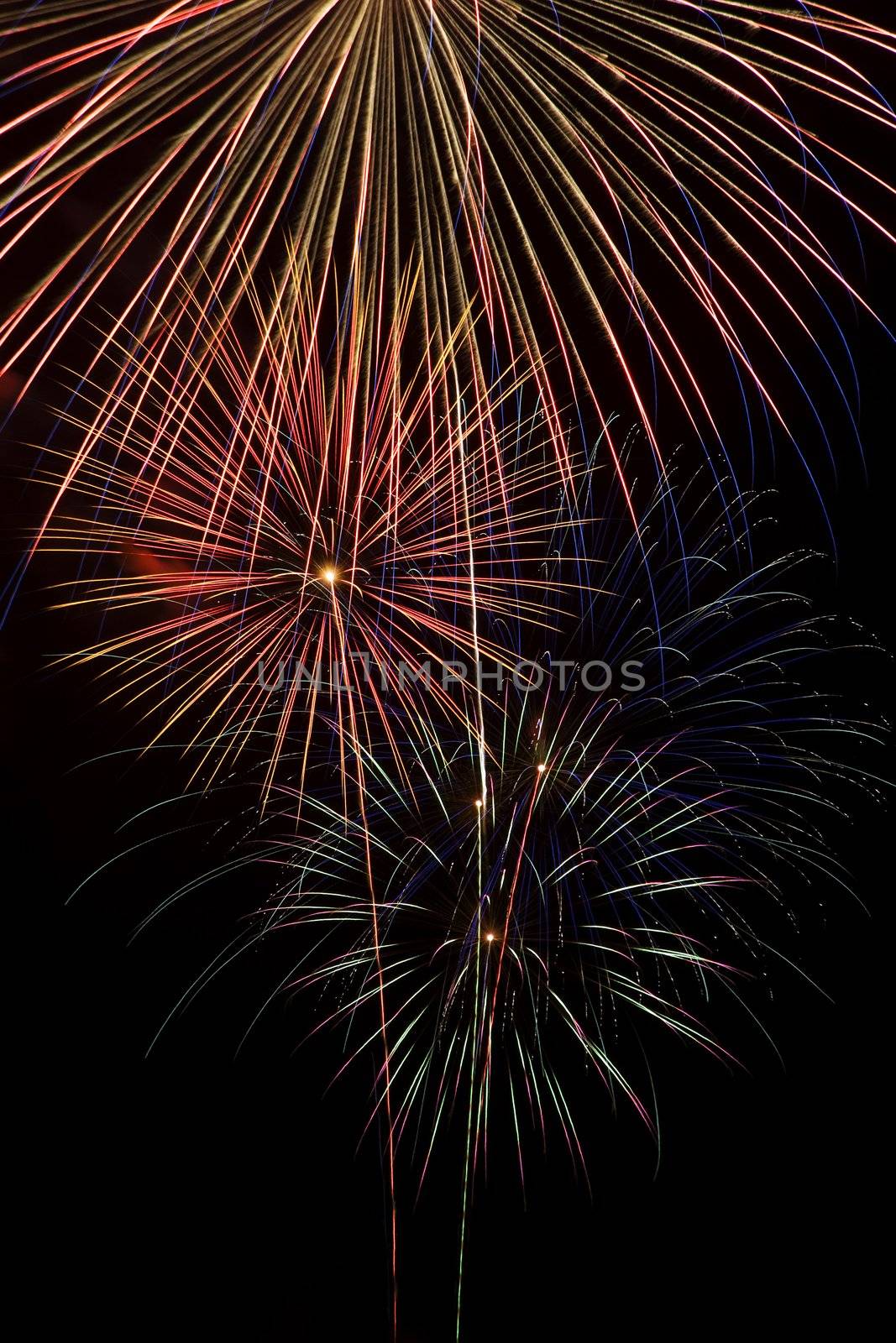 Long exposure closeup of a multiple fireworks explosions