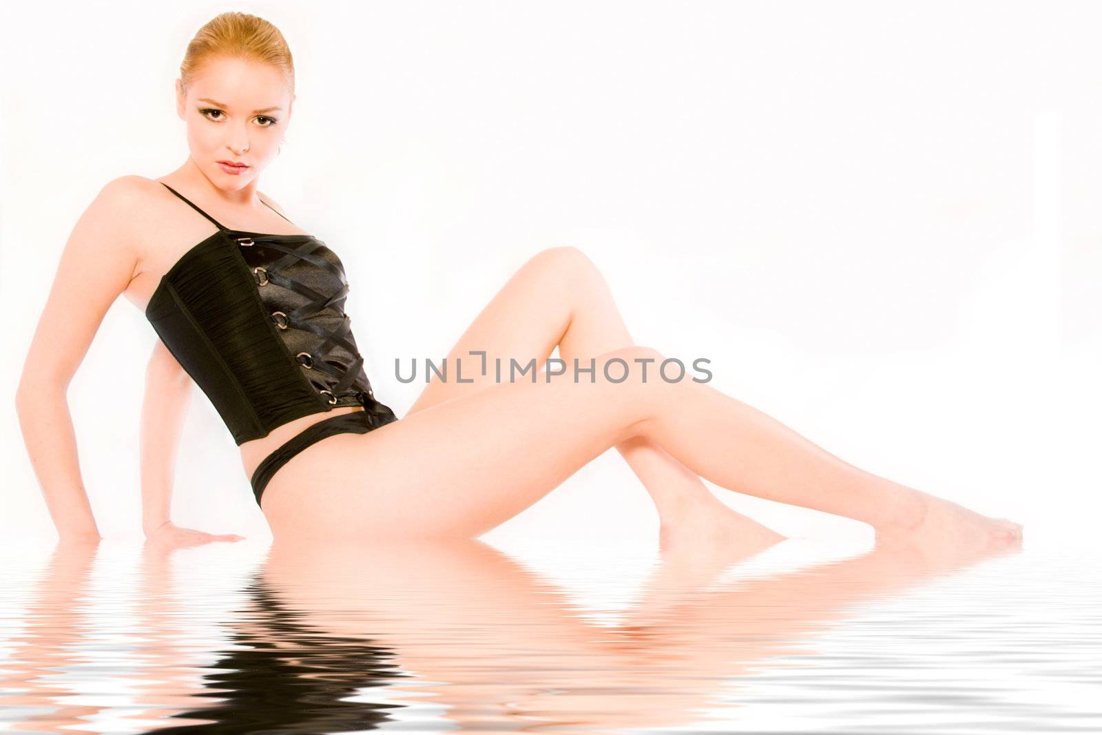 model sitting on white background