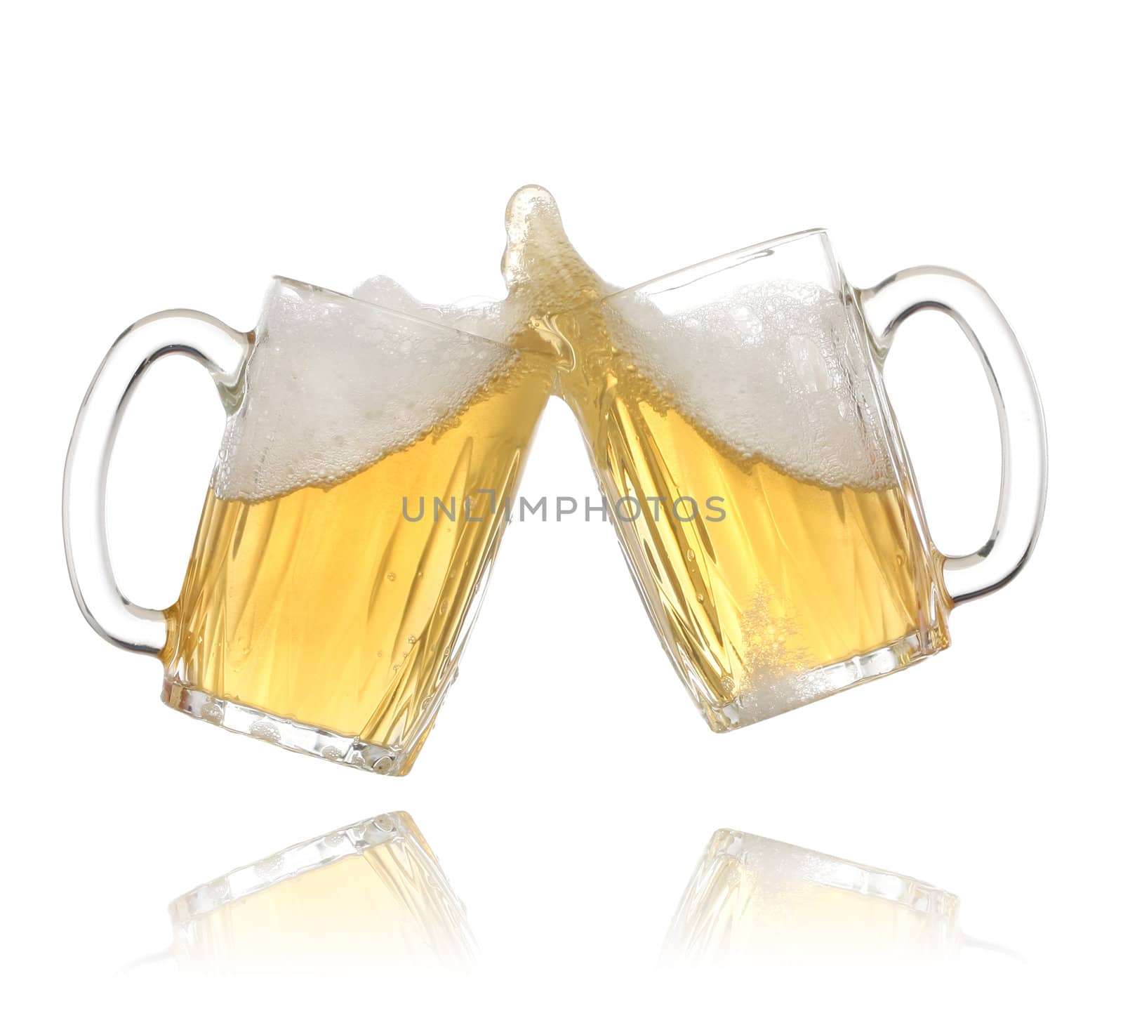 Pair of beer glasses making a toast. Beer splash