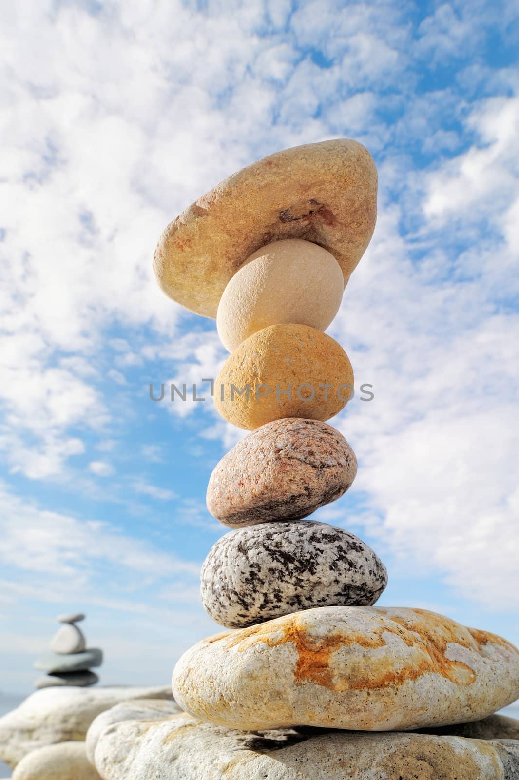 Pile of pebble on background cloudy sky