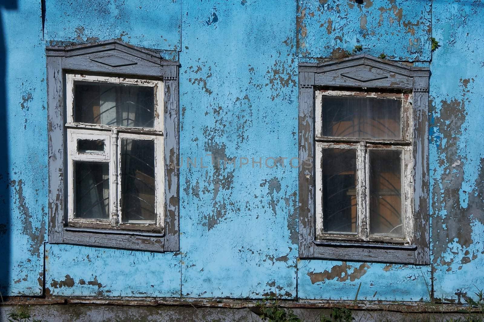 Pair of aged ruined urban window