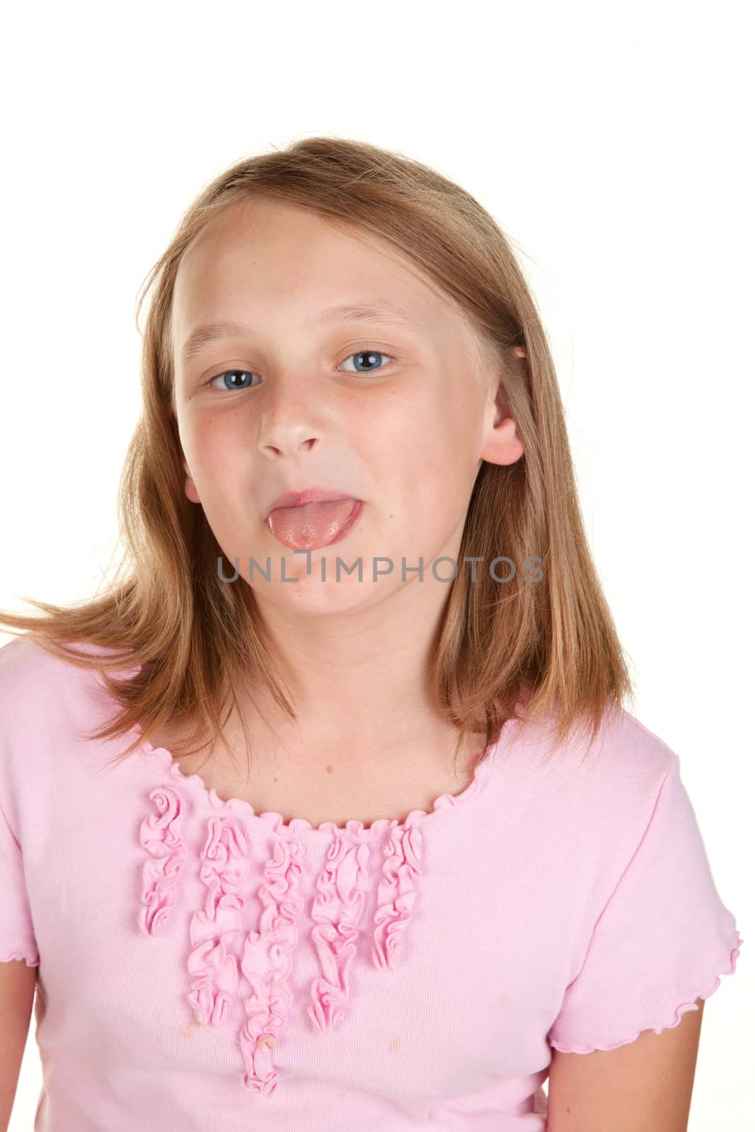 young girl poking out tongue  isolated on white