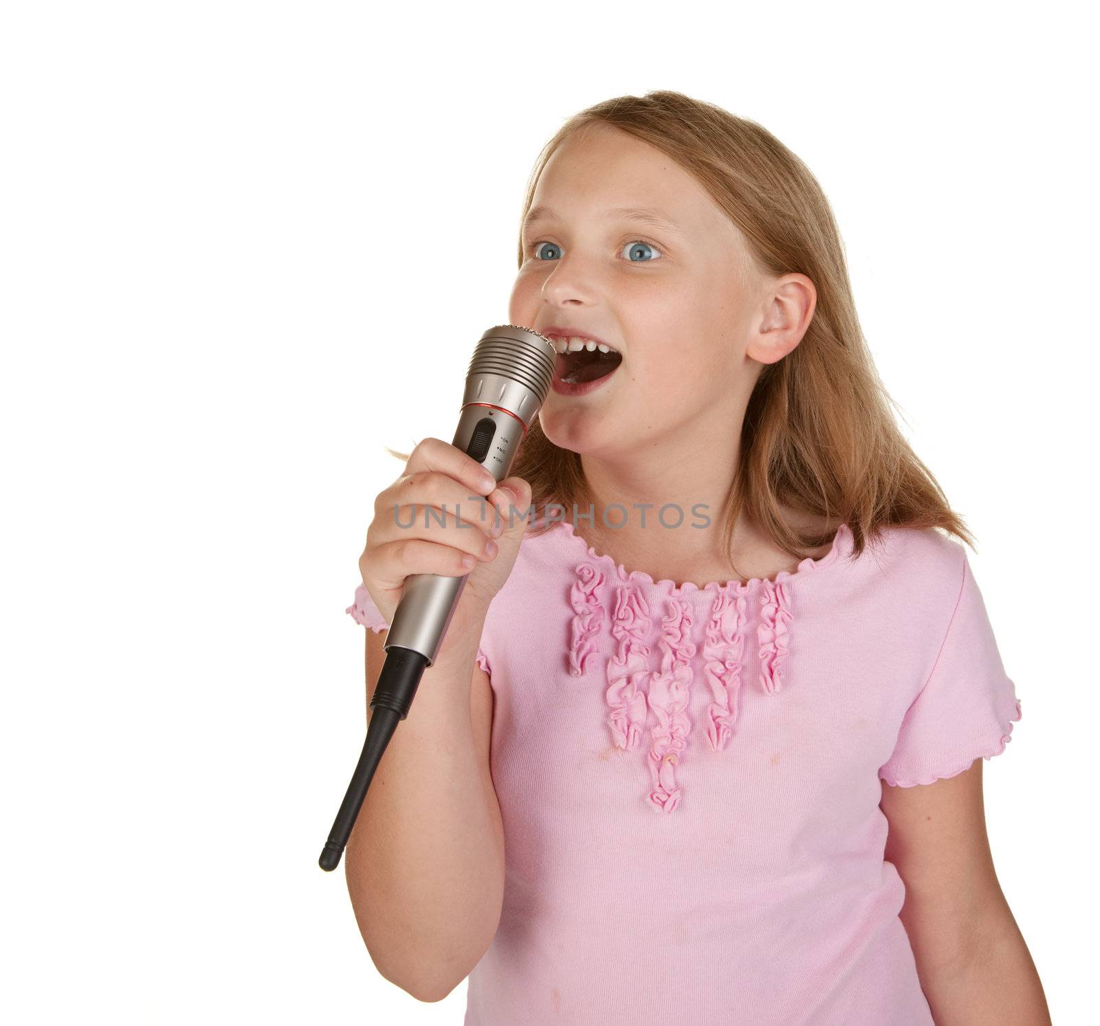 young girl singing karaoke isolated on white