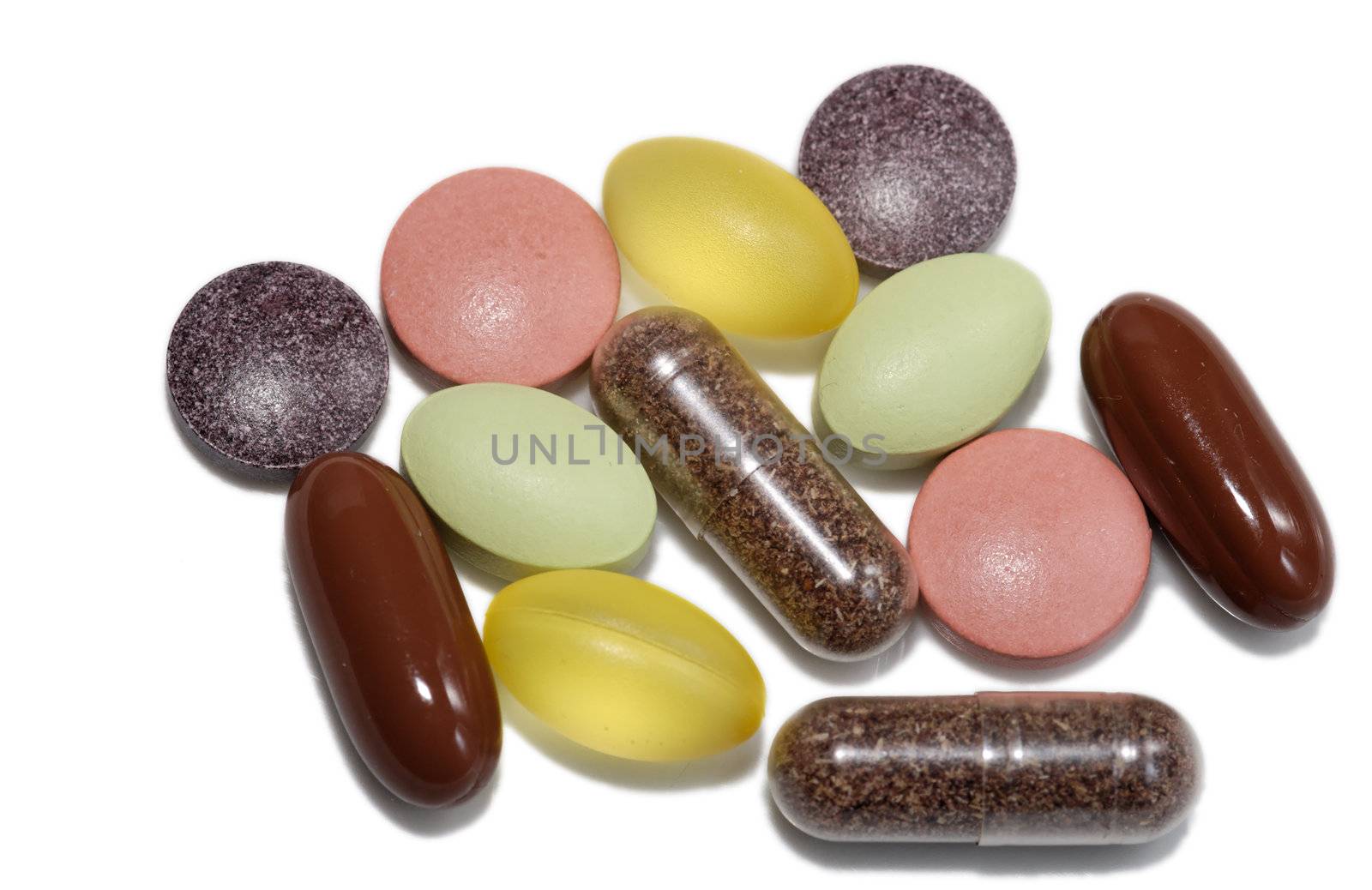Several vitamin pills and capsules from above.
