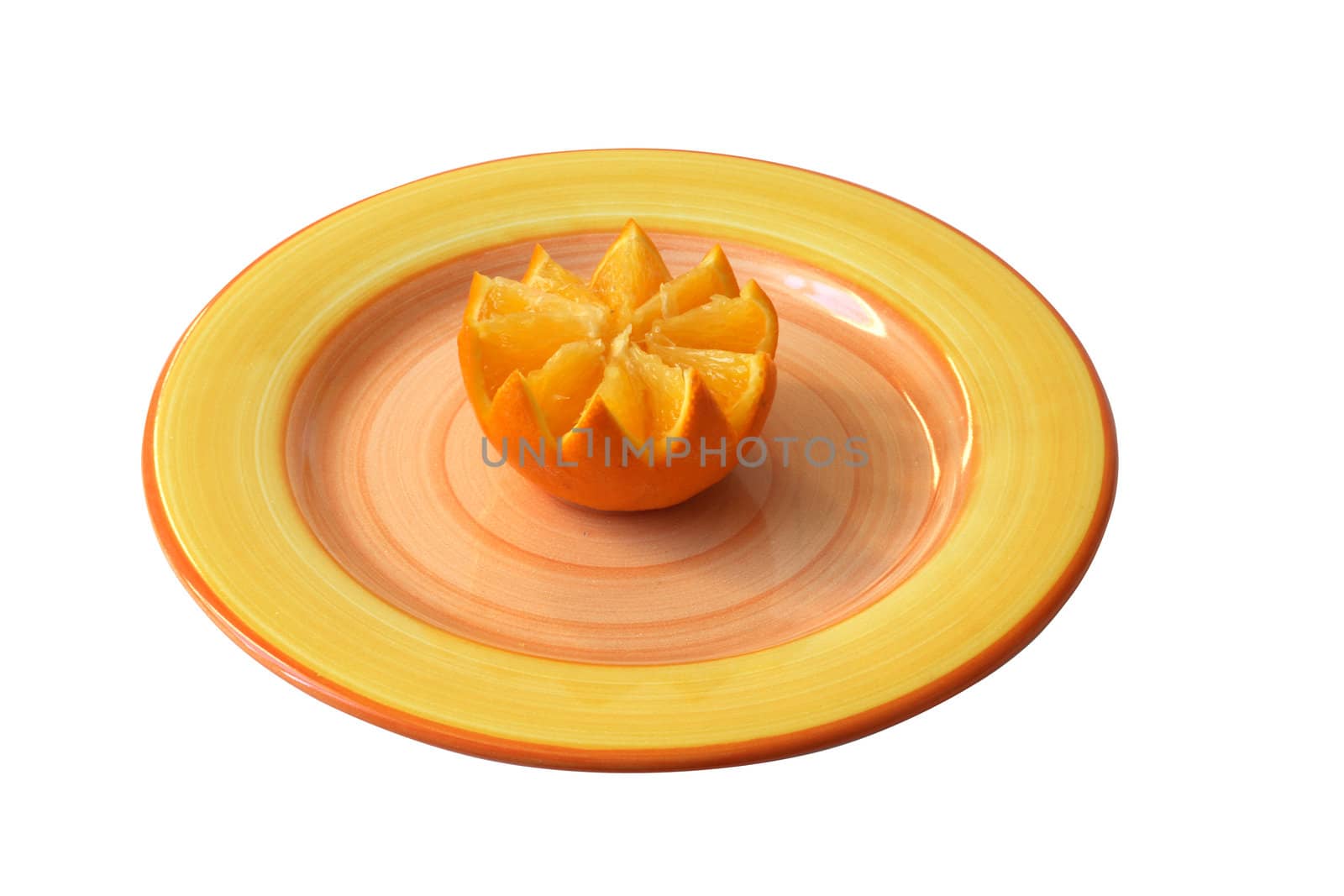 orange on the colorful saucer isolated on white background