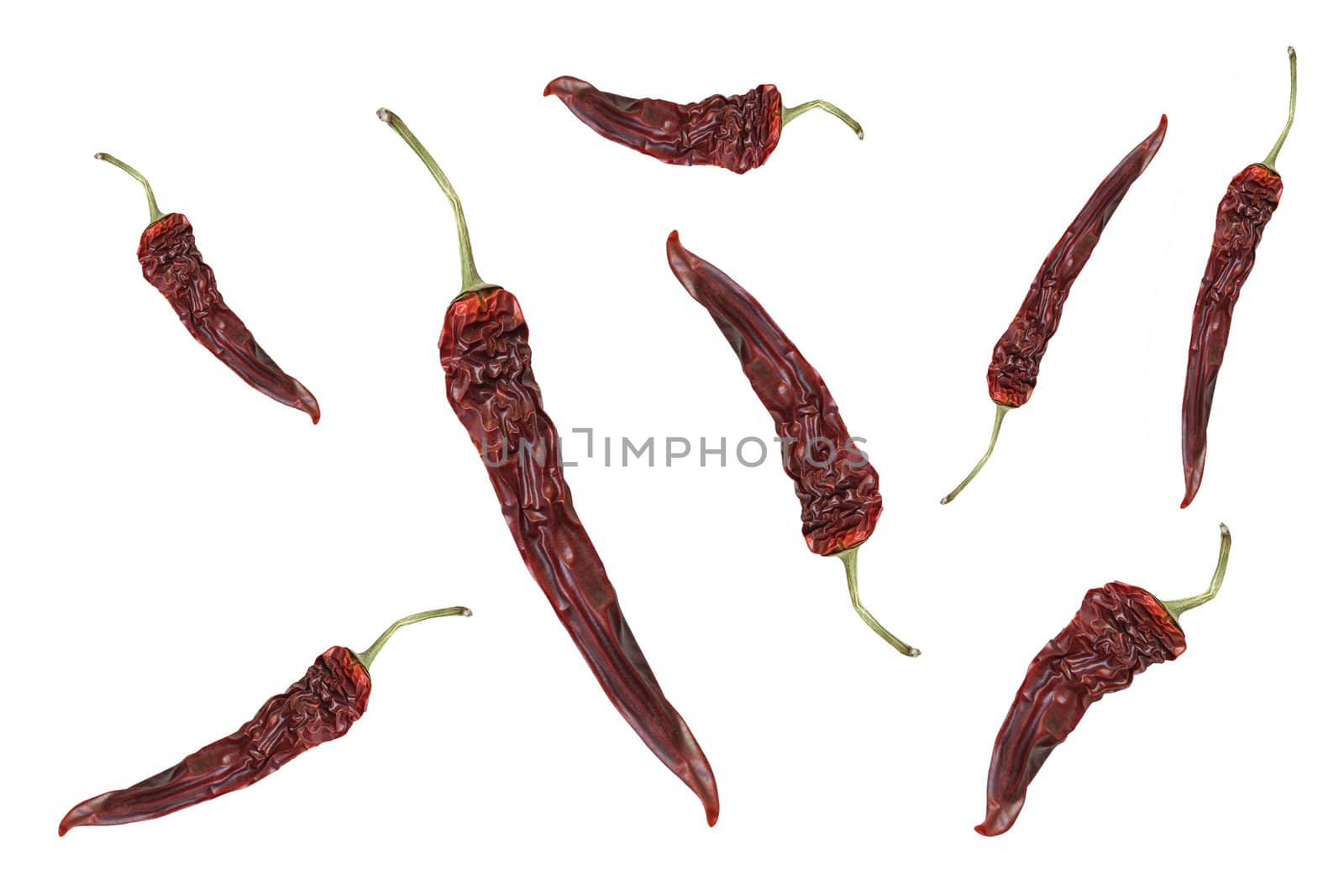 three peppers on white background