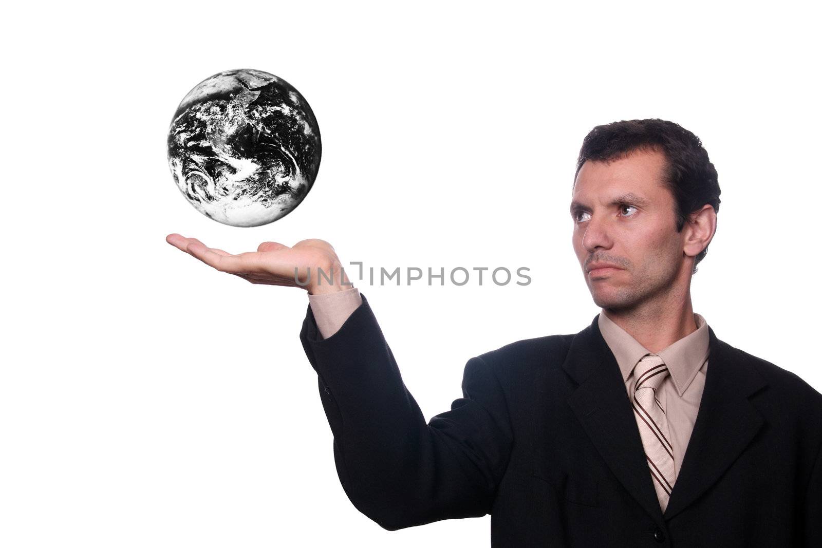 businessman holding earth result of polution and war by jpcasais