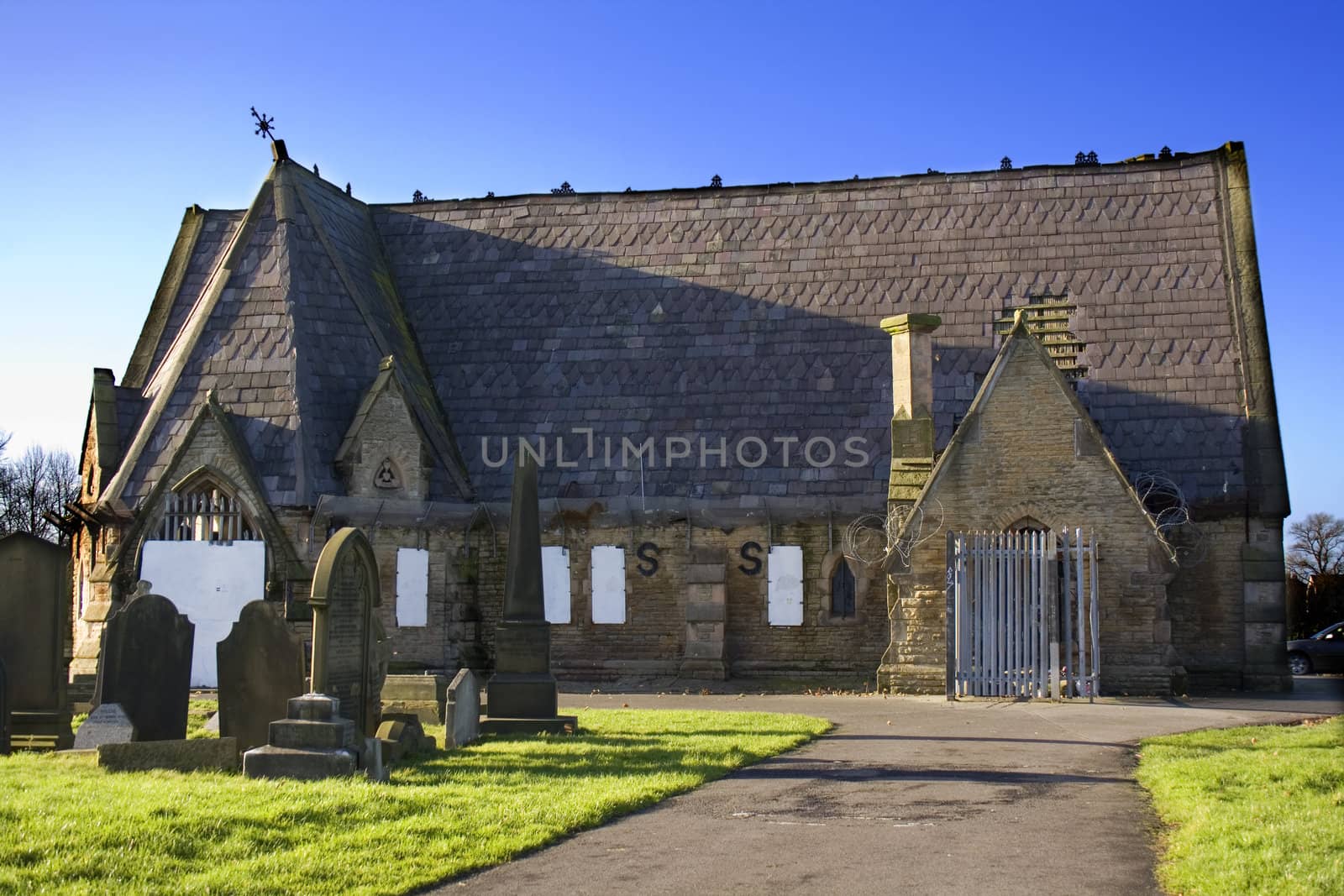 Old abandoned building in graveyard