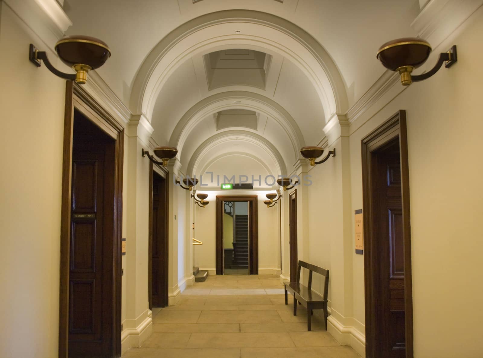 Elegant hallway with ornate arched ceiling