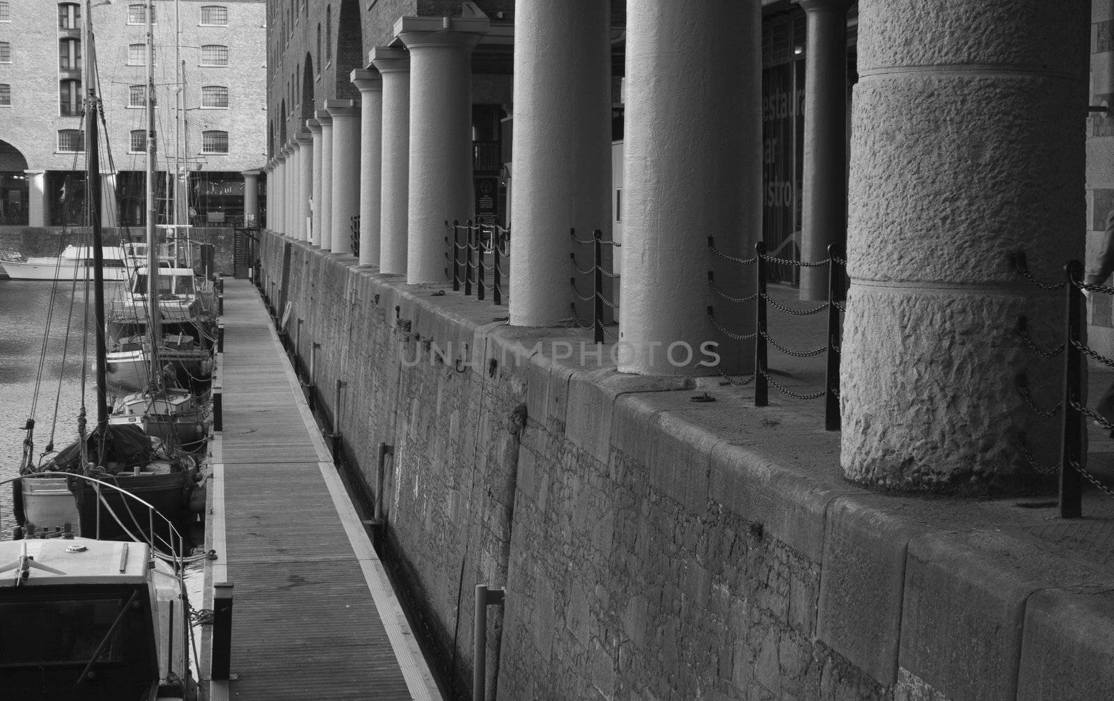 Black and white image of ships in dock (dock built in 1846)