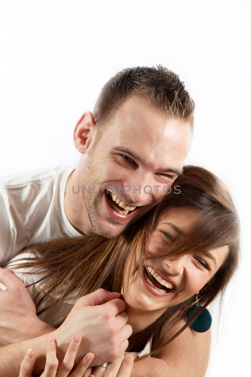 happy young couple laughing together by Farina6000