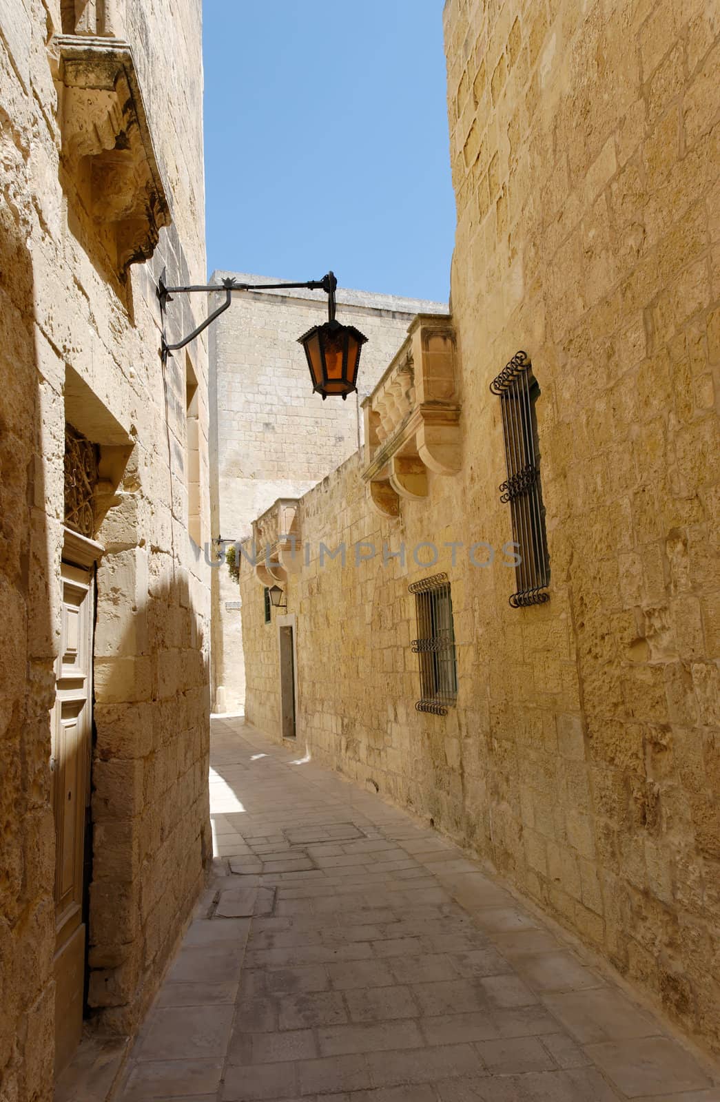 The empty silent narrow street of the Silent City - Mdina on Malta.
