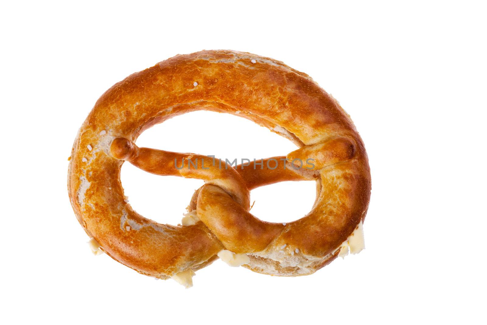 bavarian pretzel with butter isolated on white