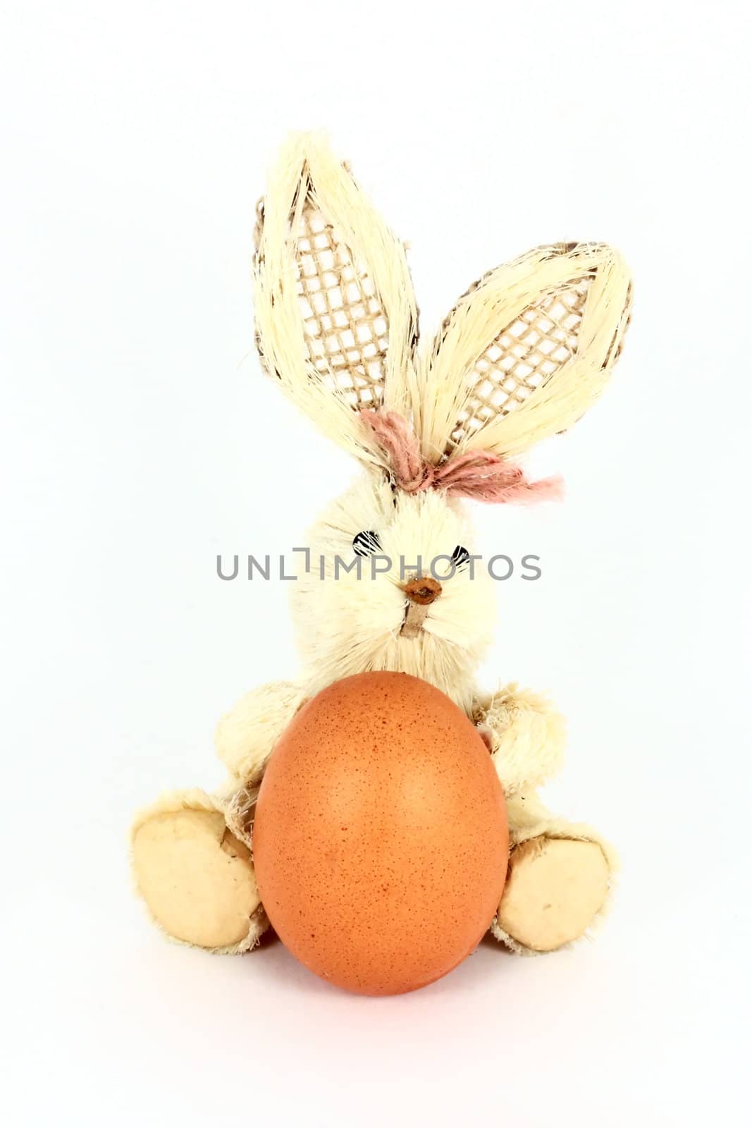 Easter decoration with egg and rabbit, isolated on white