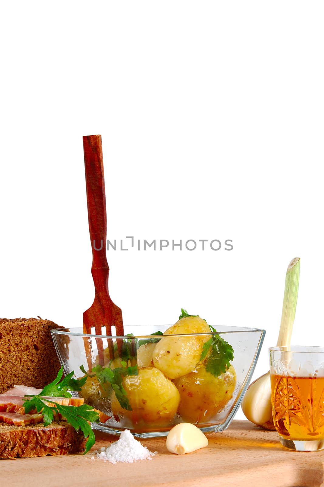 Isolated on white composition of bread, boiled potatos, bacon and other food ingredients