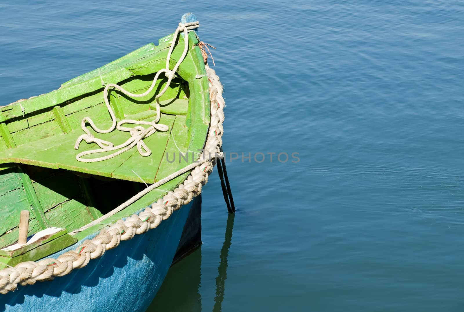 An old and battered boat in the fishing village of Marsaxlokk