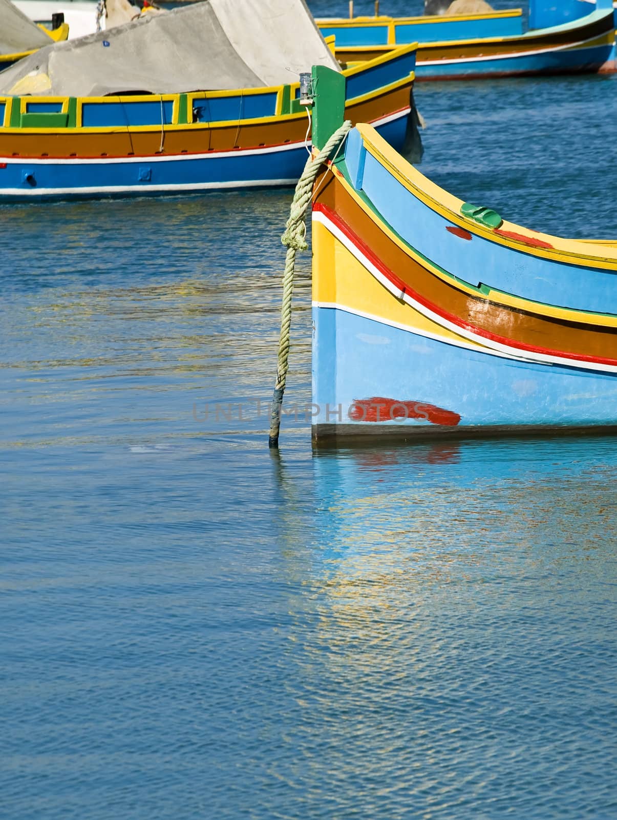 Traditional fishing boats of Malta in the fishing village of Marsaxlokk