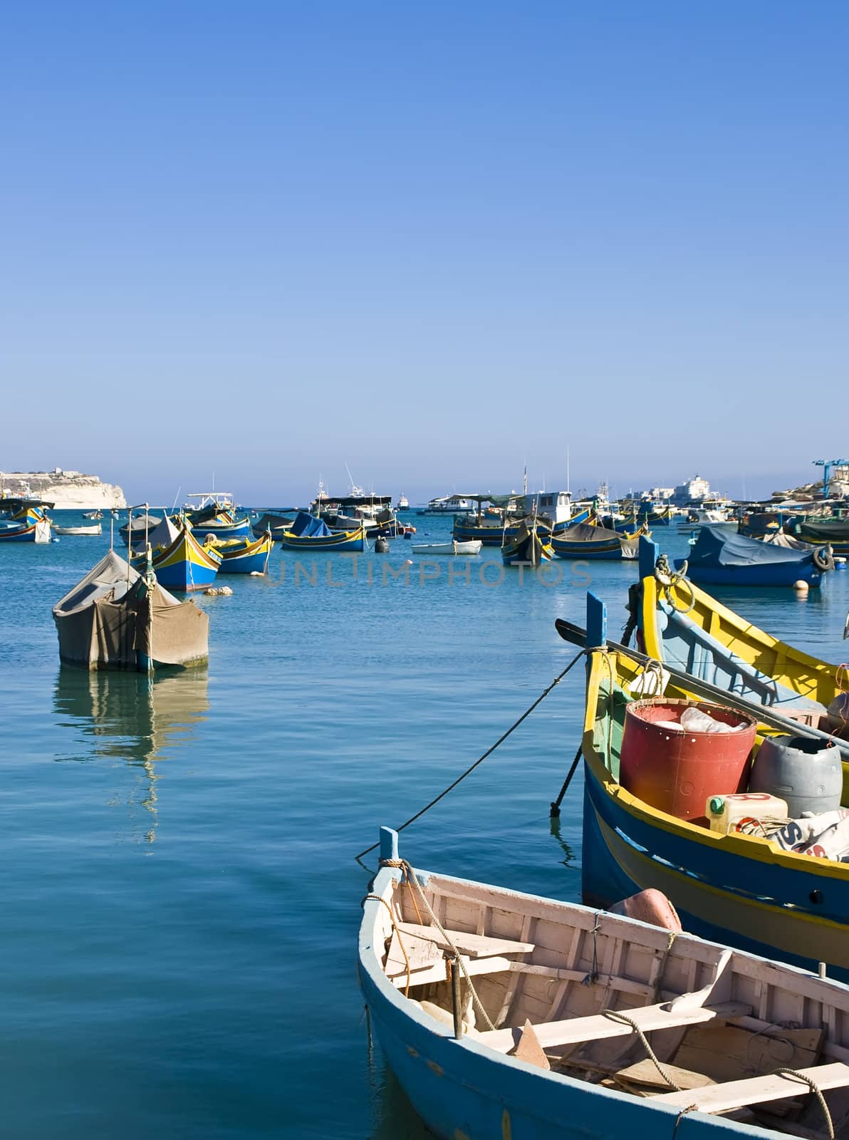 Traditional fishing boats of Malta in the fishing village of Marsaxlokk