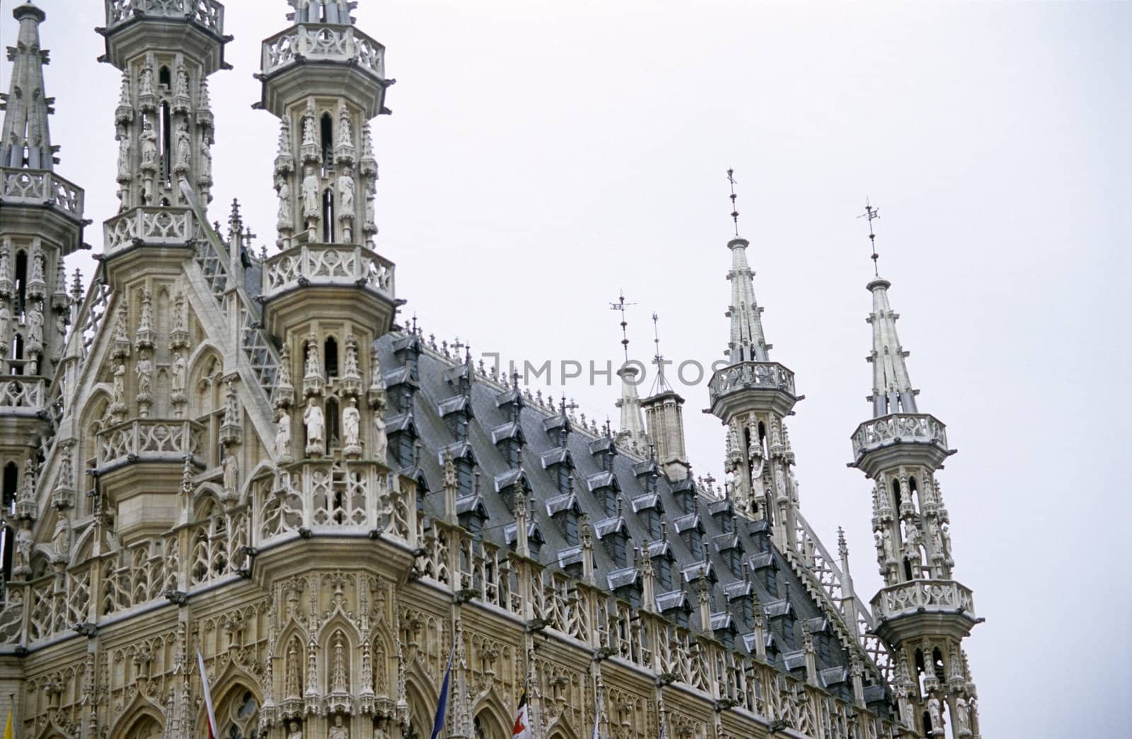 Detail of the ornate roof of the city hall building in Leuven, Belgium.