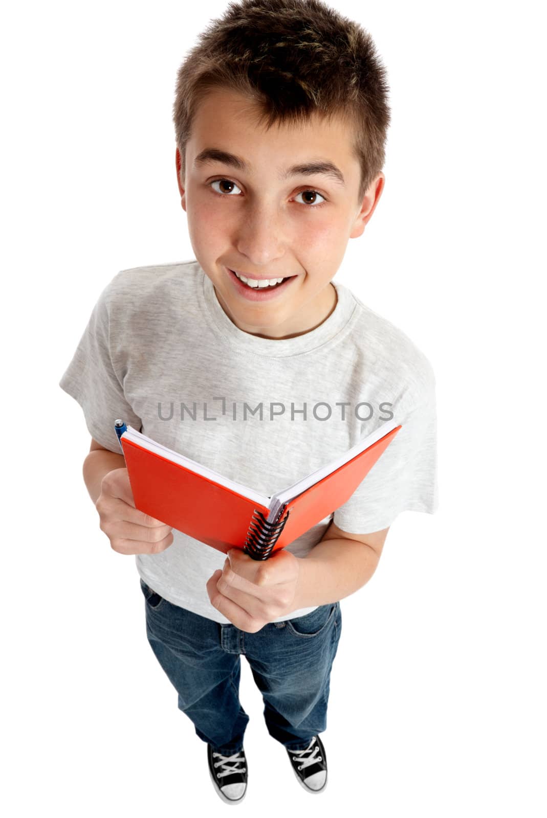 A boy or a student holding a spiral notepad book.
