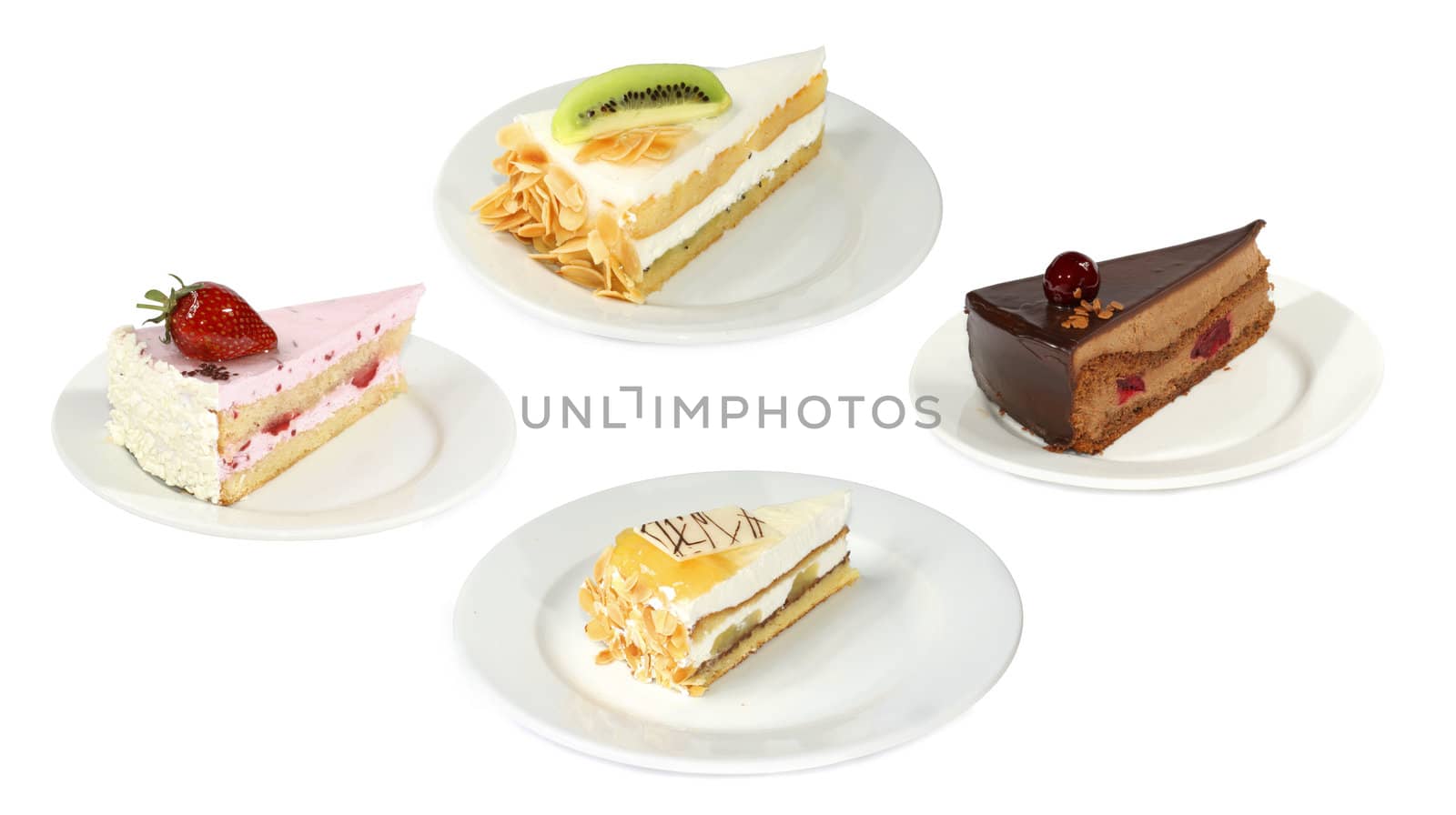 Four plates with cakes by AlexKhrom