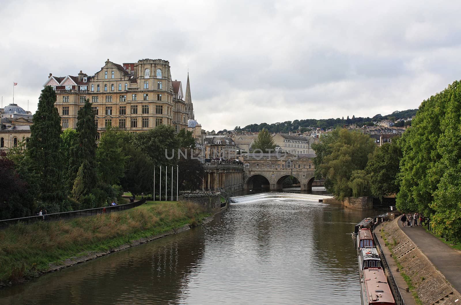 View of Bath and River Avon: Pultney Bridge, the Empire, riverside walk.