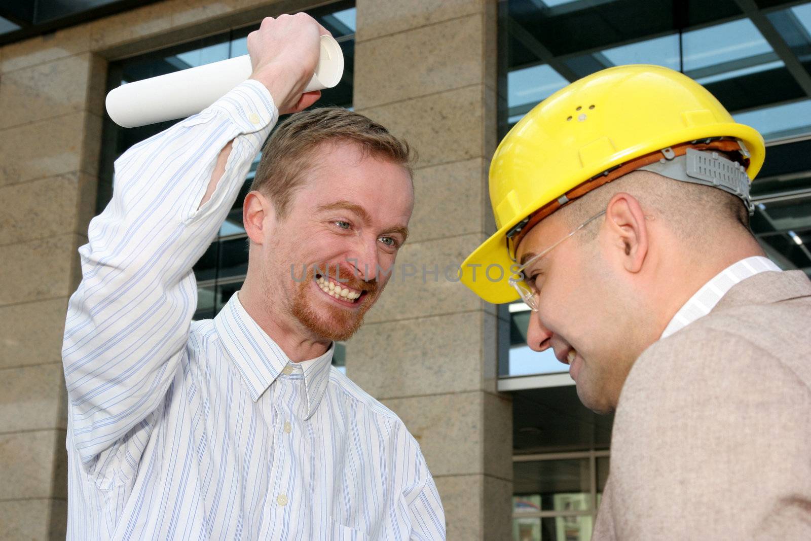 angry architect and businessman with architectural plans