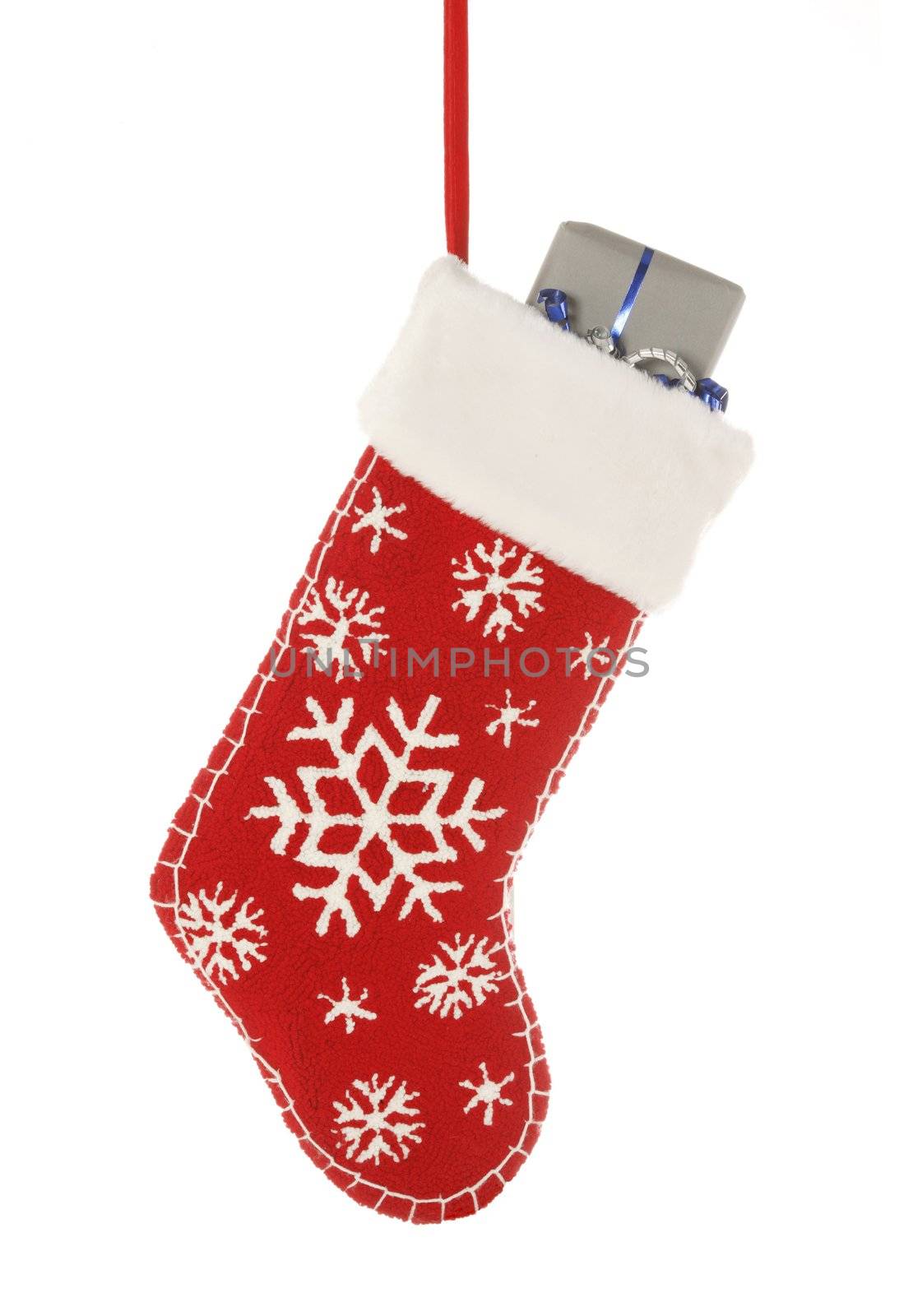 Christmast stocking with present isolated on white