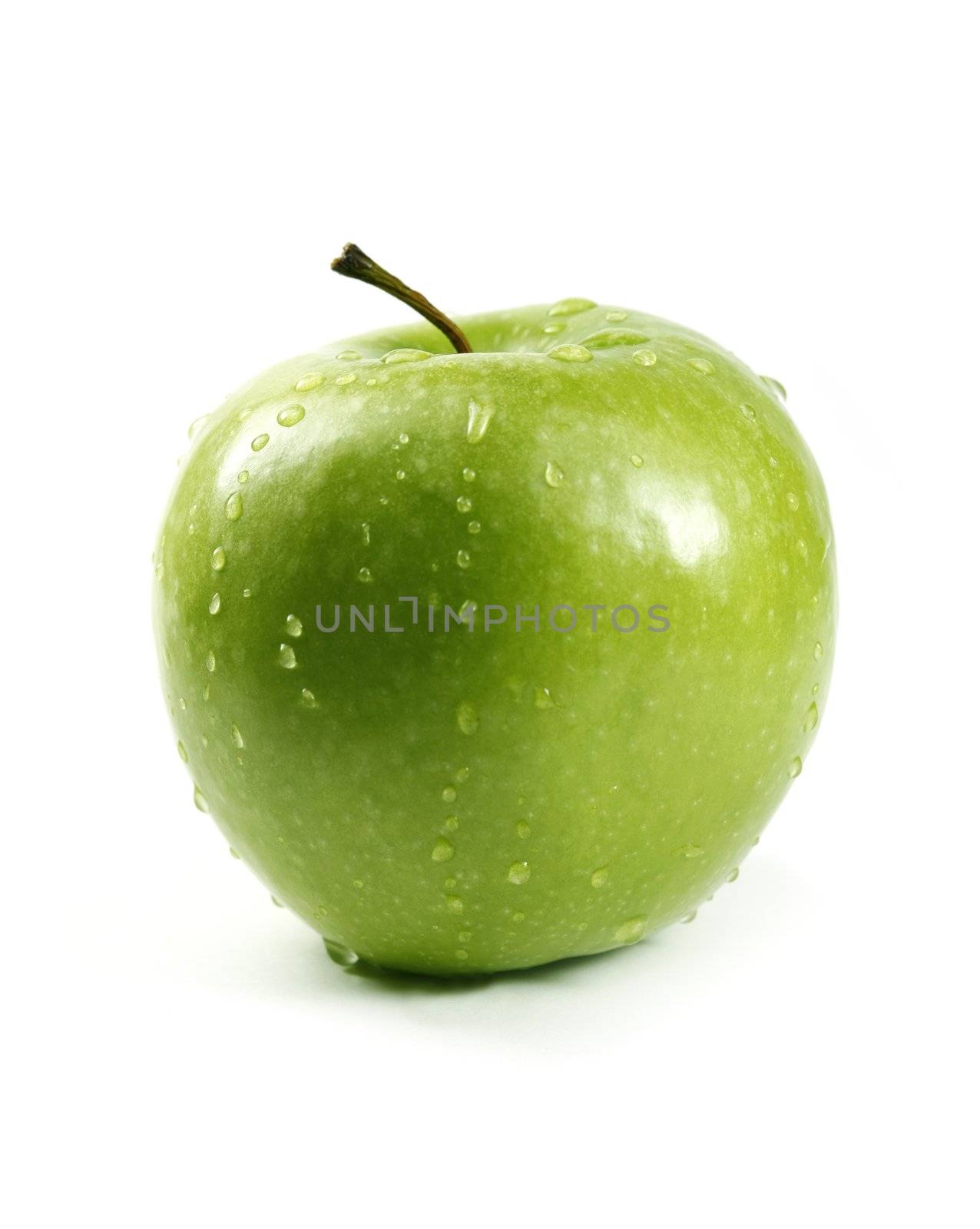 Juicy green apple isolated on white in studio - XXL file with selective focus