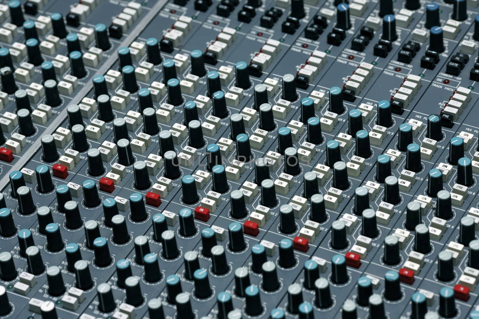 Detail of a mixing board in a recording studio - This is shot in a real studio  - some dust visible