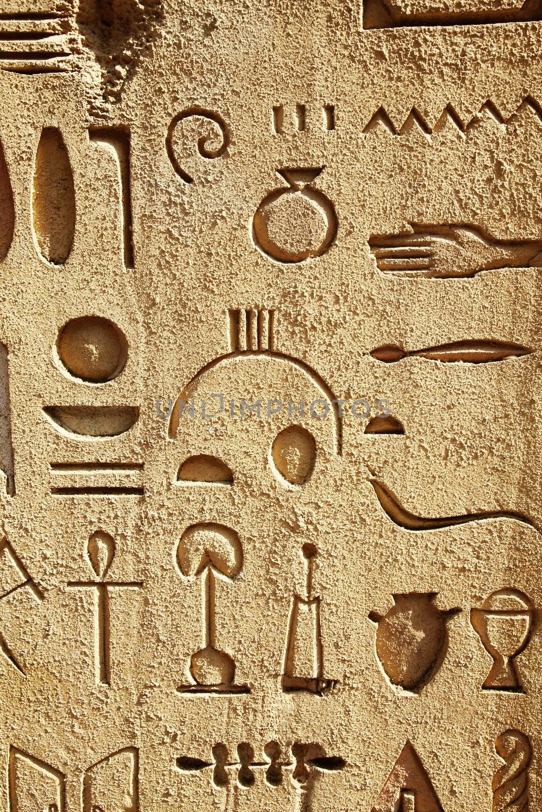 wall with egyptian hieroglyphics and symbols