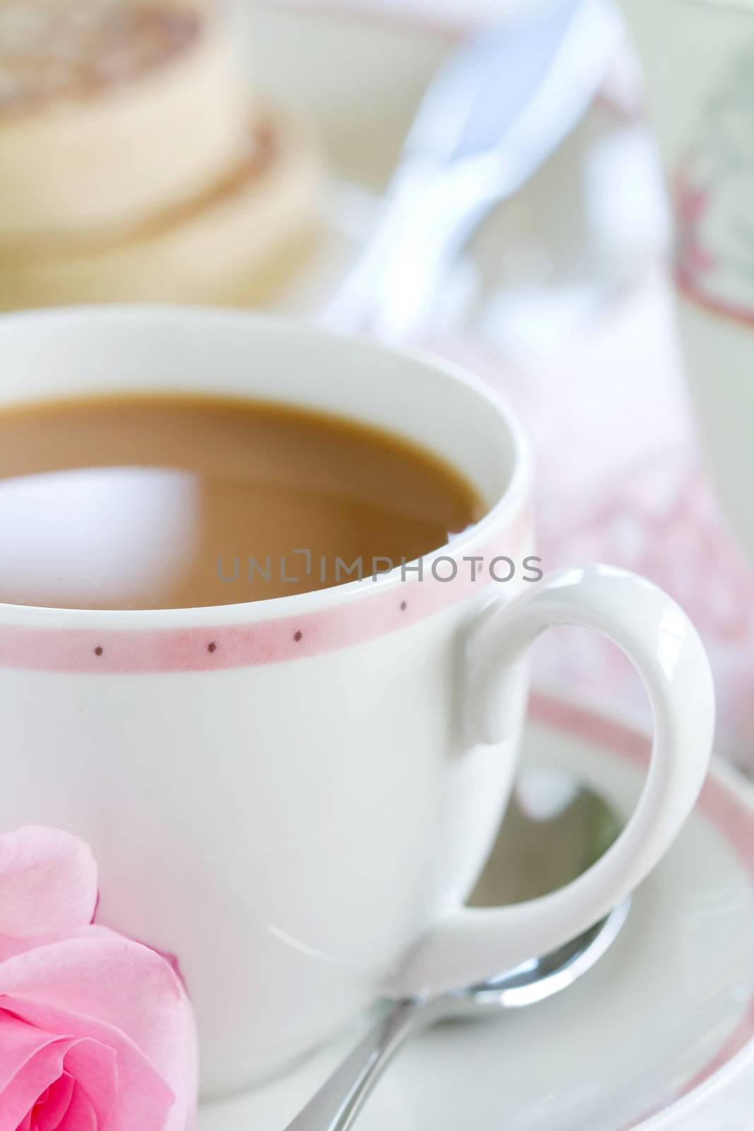 Tea and crumpets, served with a single rose