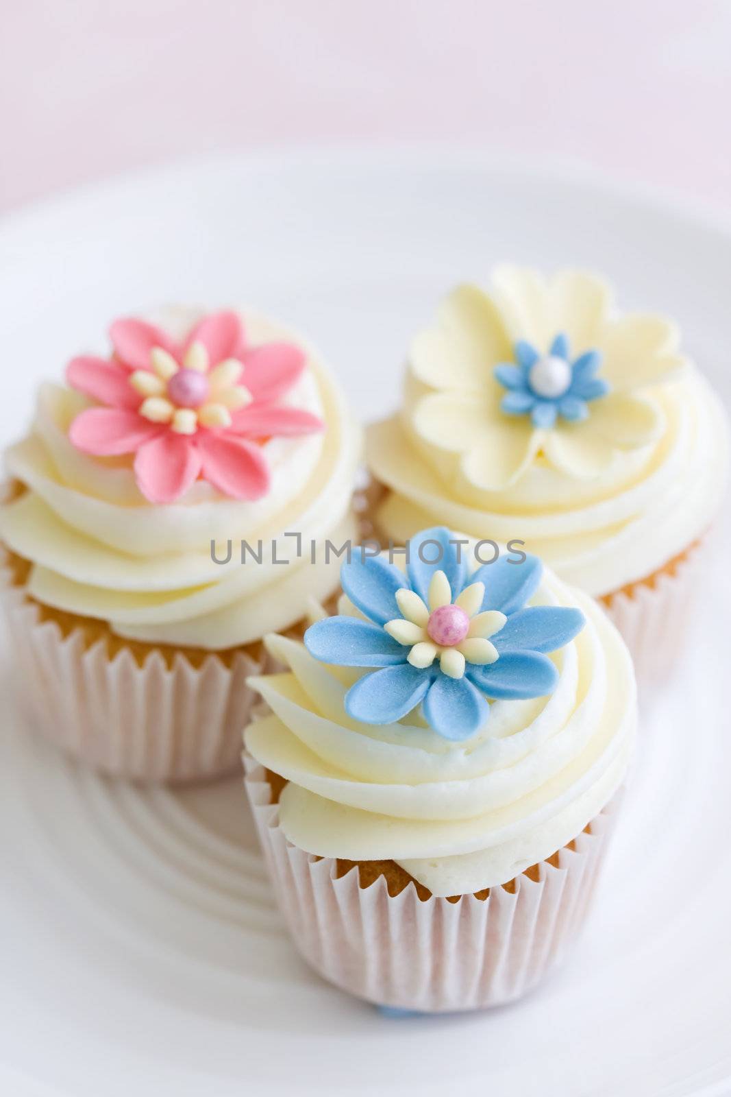 Flower cupcakes on a white plate