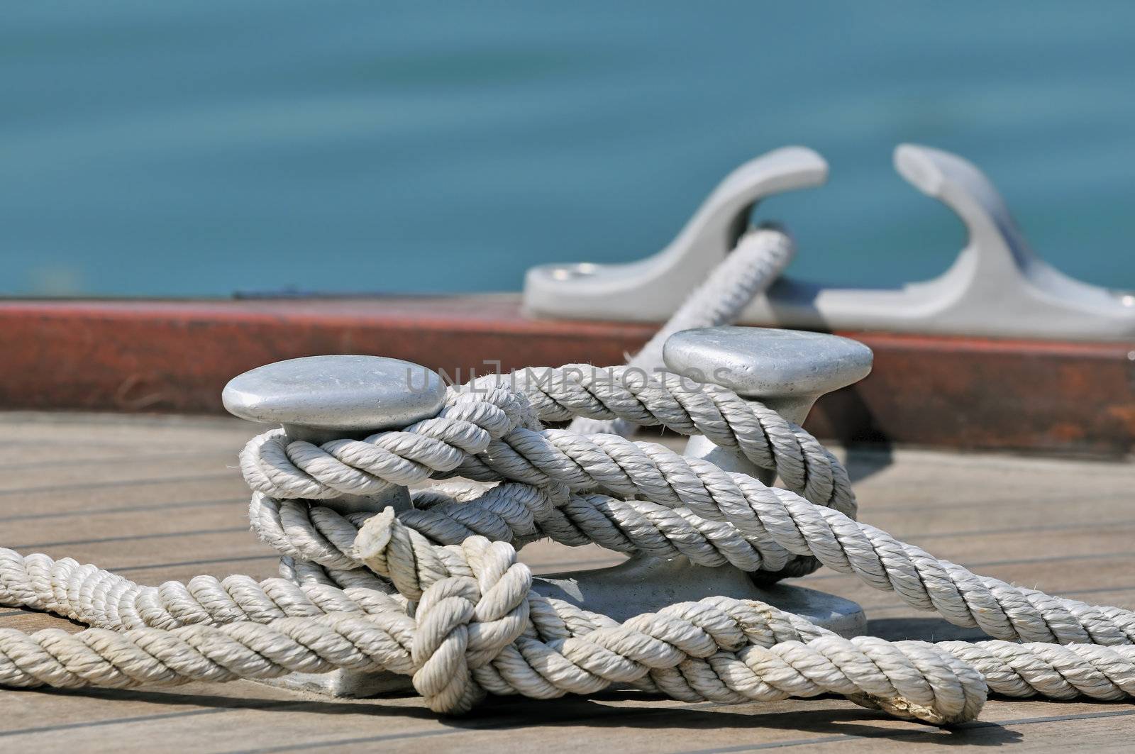 Close-up of rope tied up on a bitt