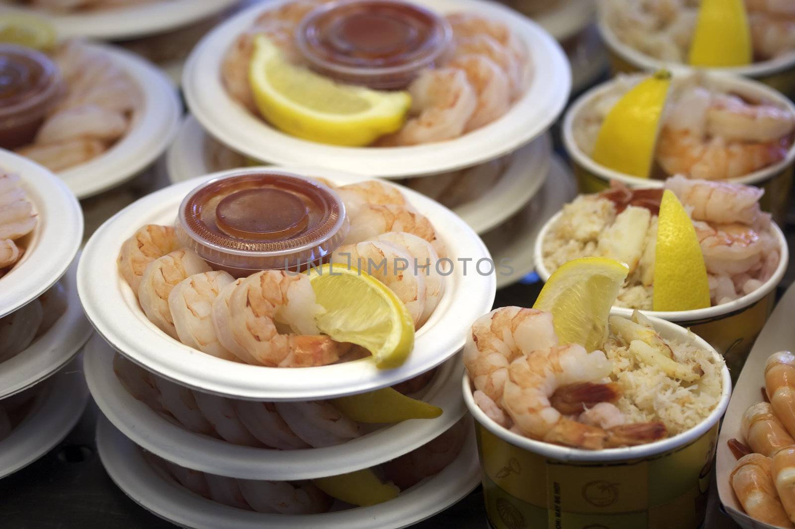 A shot of shrimp and assorted seafood cocktails from the San Francisco markets.