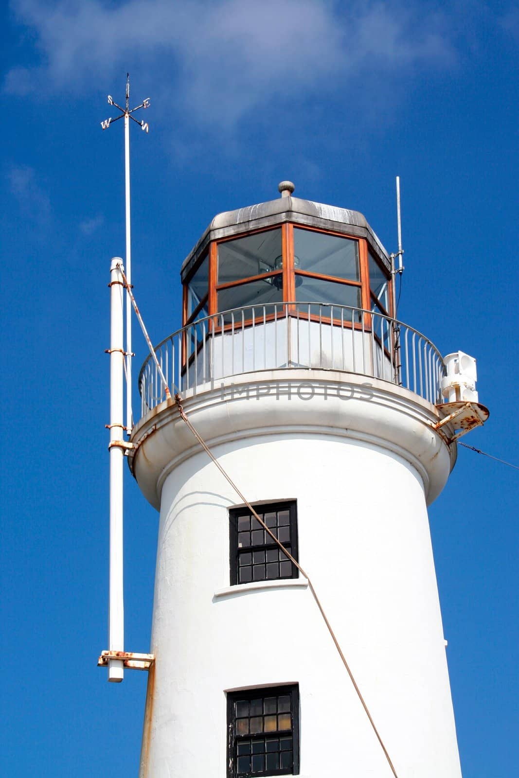 Exterior details of white lighthouse building, Scarborough, England.