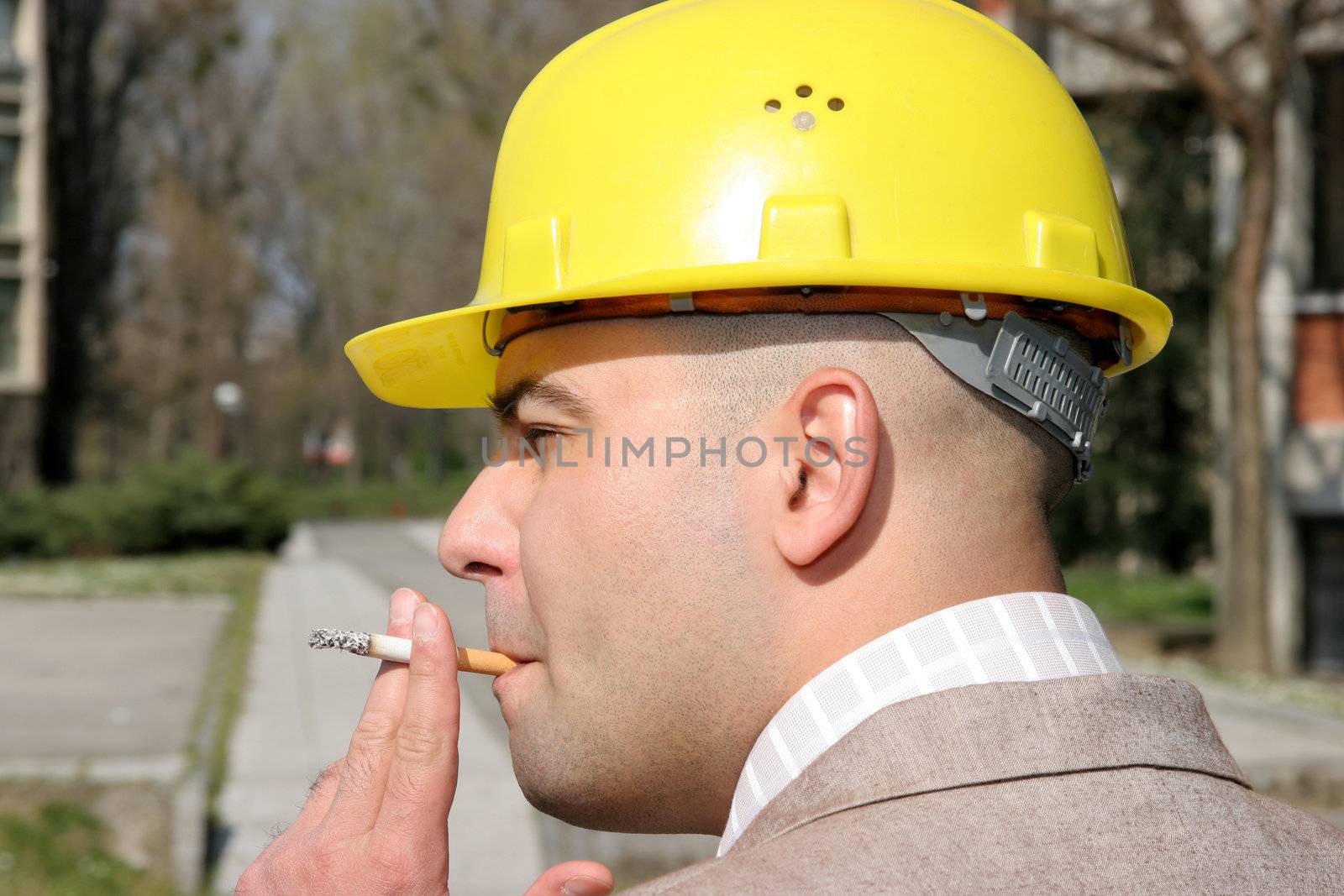 Businessman with cigarette, 