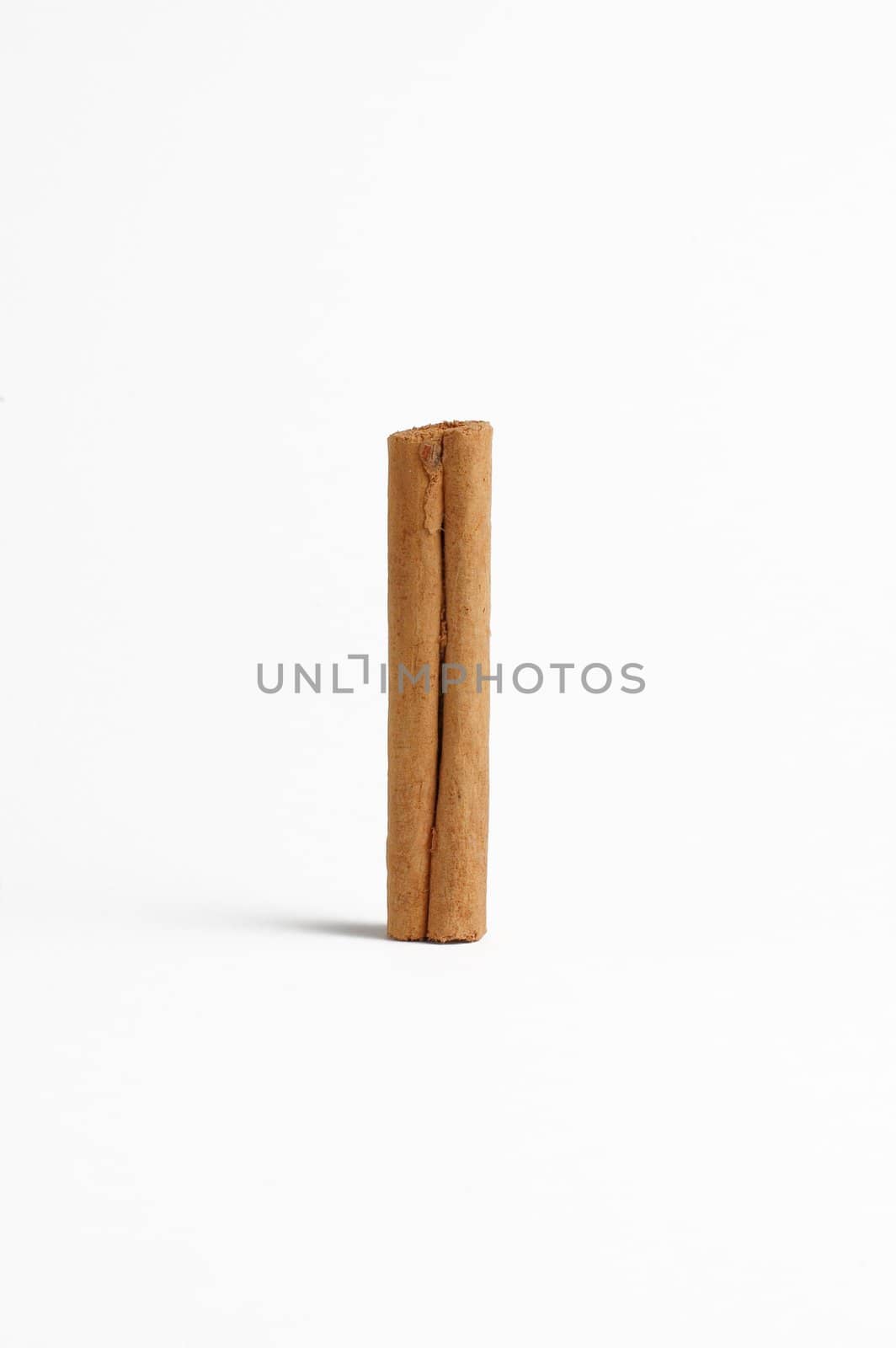 Cinnamon stick display isolated on white background.