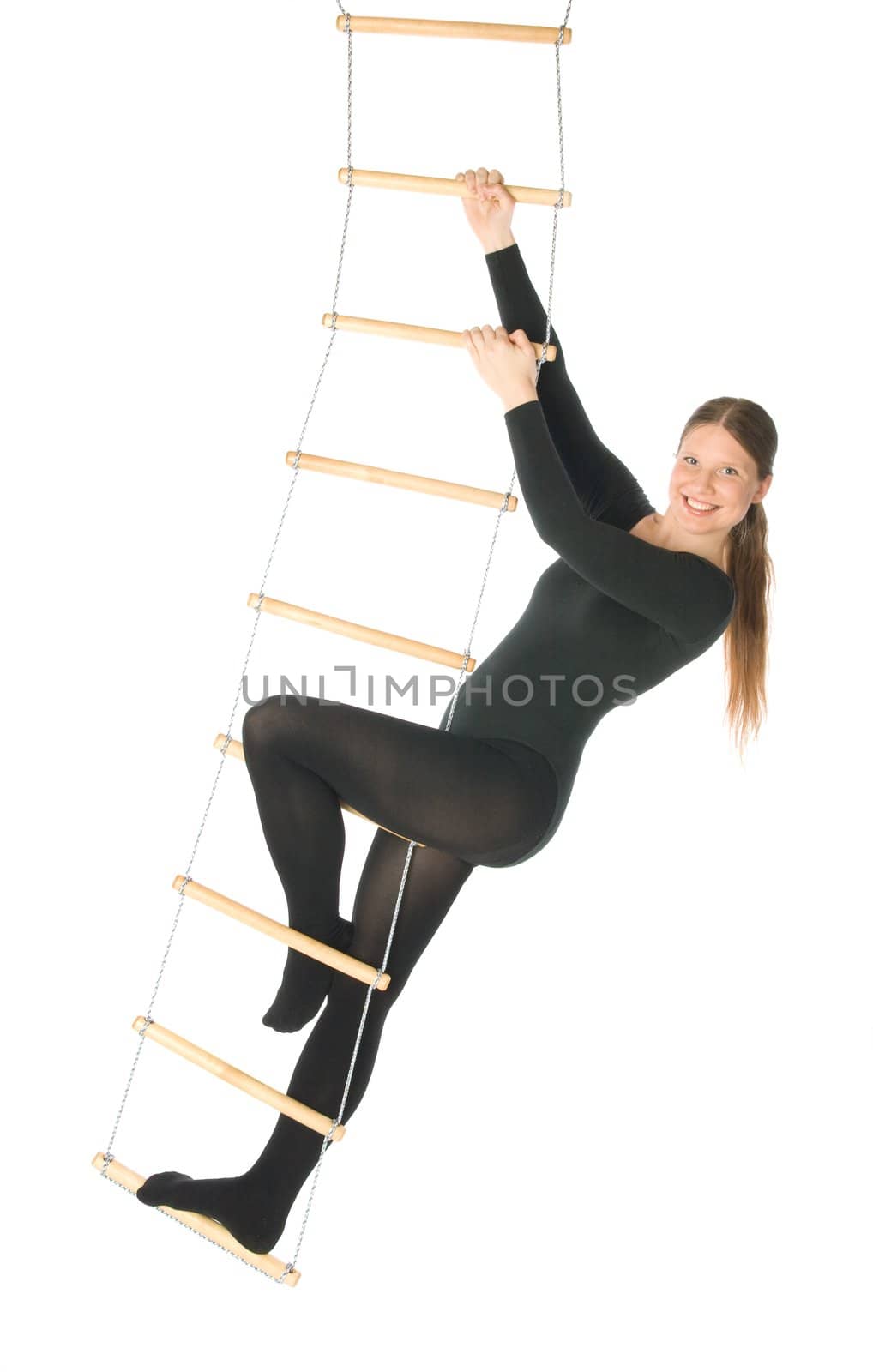 Isolated photo of a woman on a rope ladder
