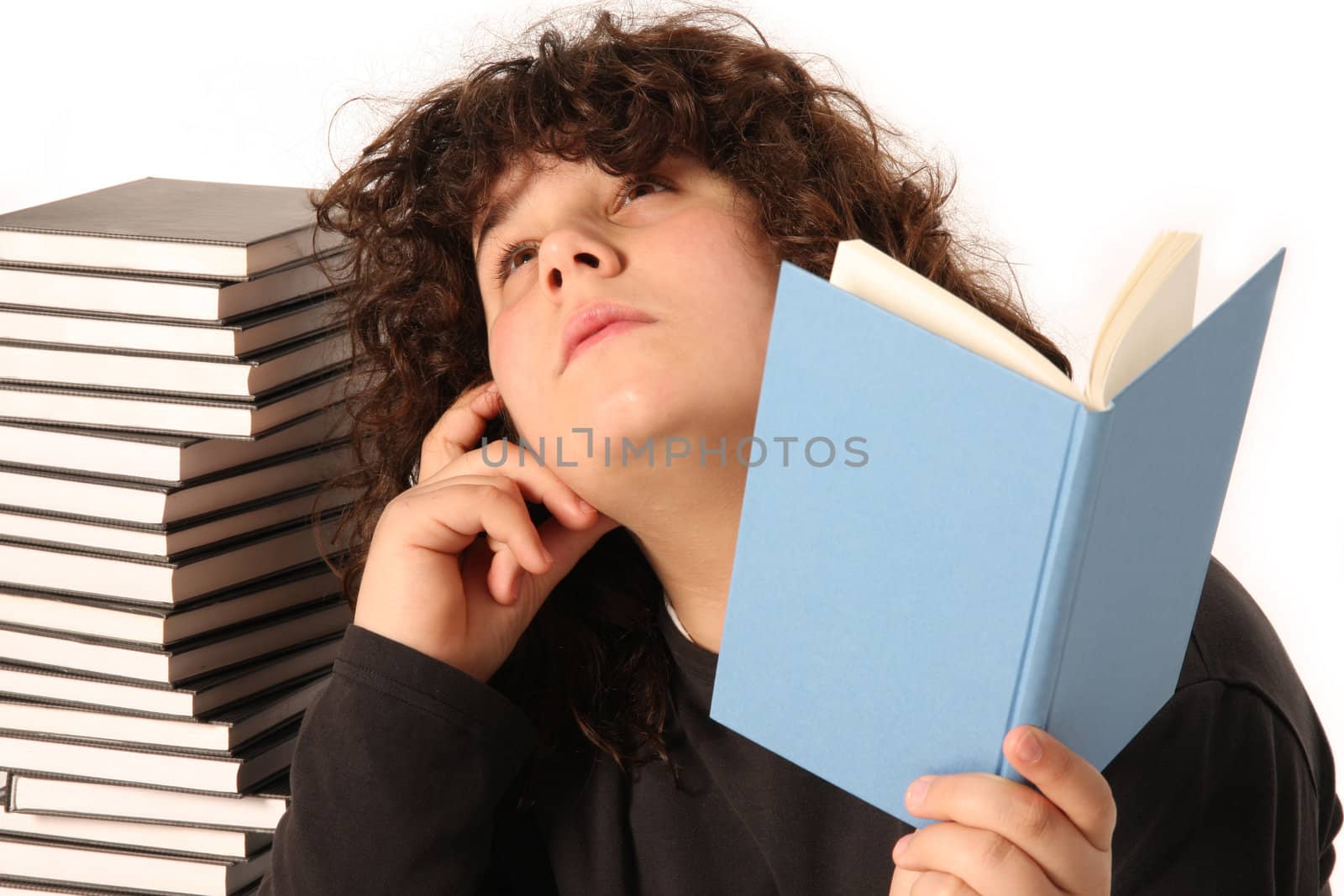 boy thinking and reading a book on white background