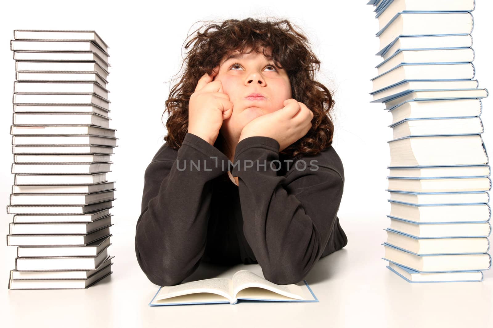 boy thinking and reading a book on white background