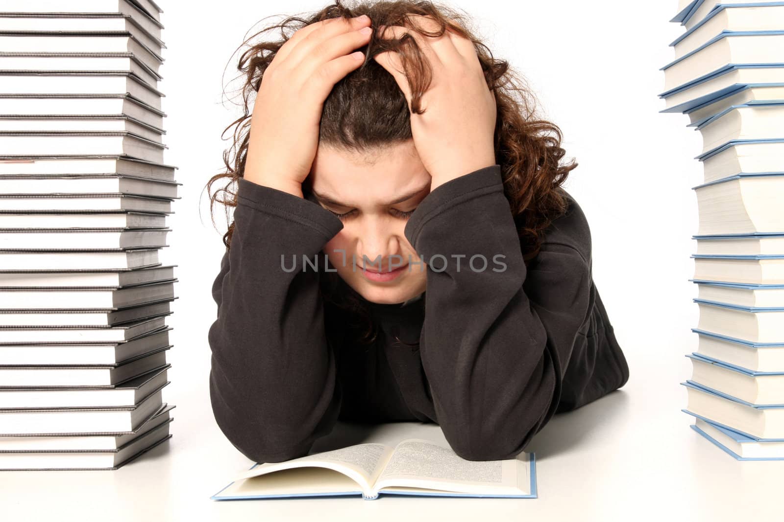 boy crying and and many books on white background