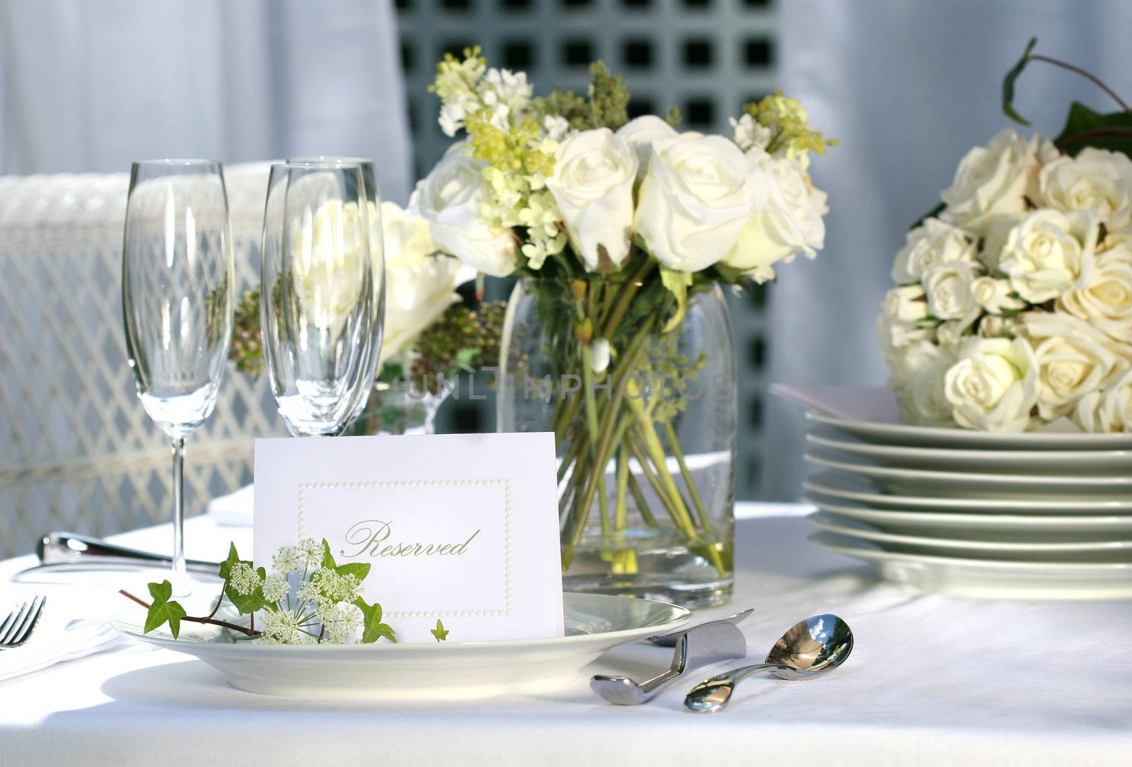 White place card on outdoor wedding table by Sandralise