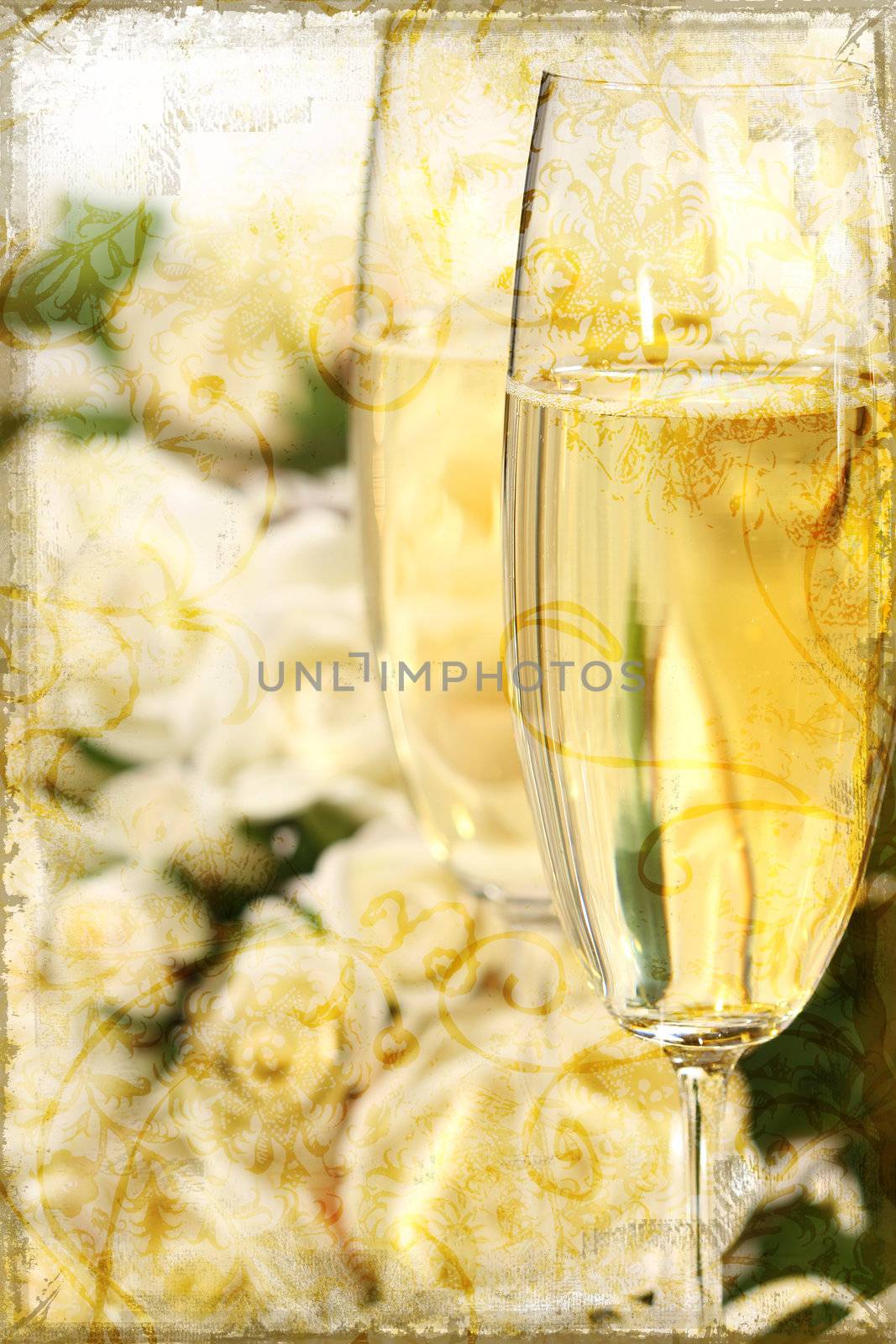 Close-up of champagne glasses with a bouquet of roses on a grunge background