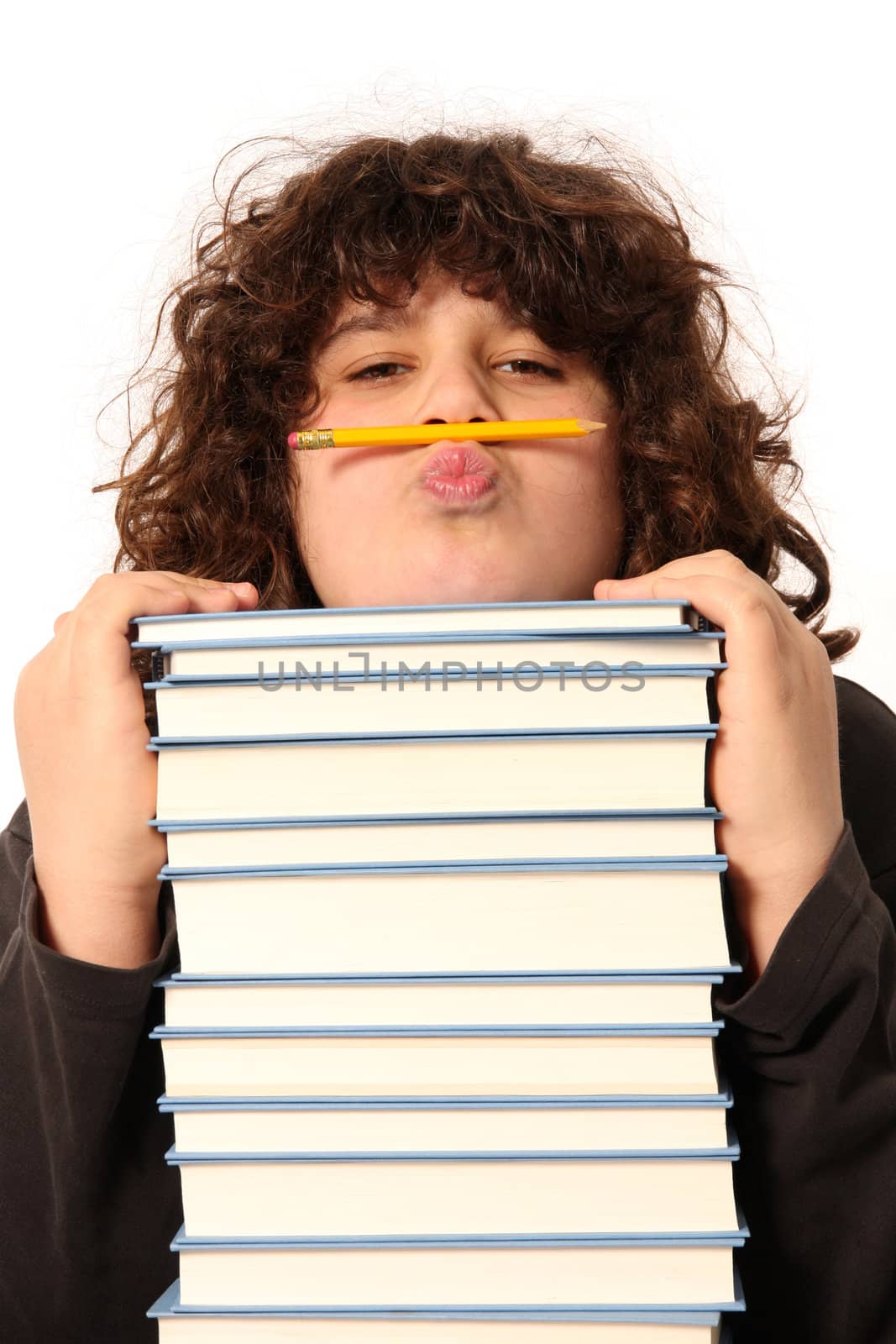 boy with pencil and books on white background